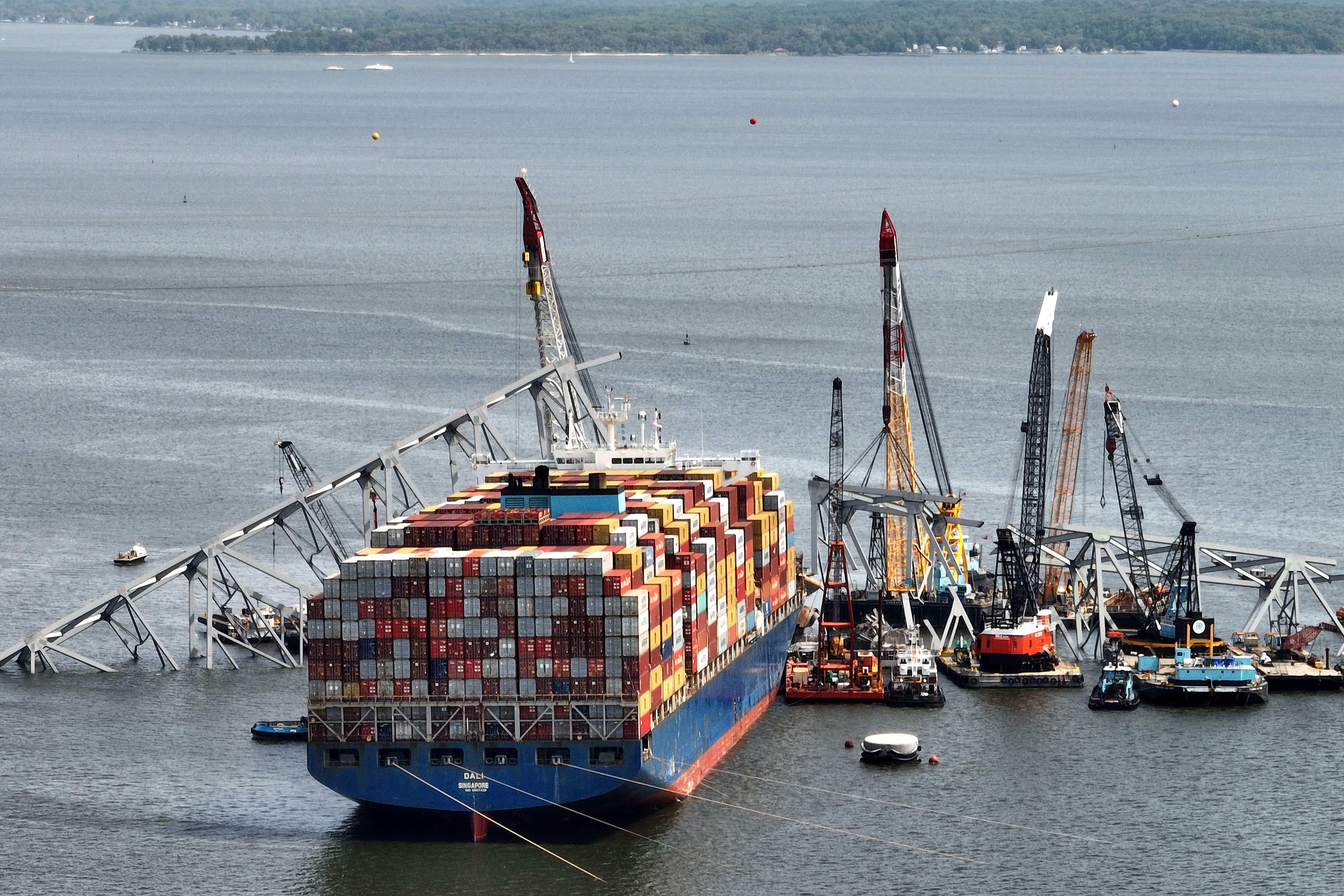 Salvage crews continue to remove wreckage from the Dali, weeks after the cargo ship collided with the Francis Scott Key Bridge. The crew of 21 is still stranded on the ship. Photo: AFP