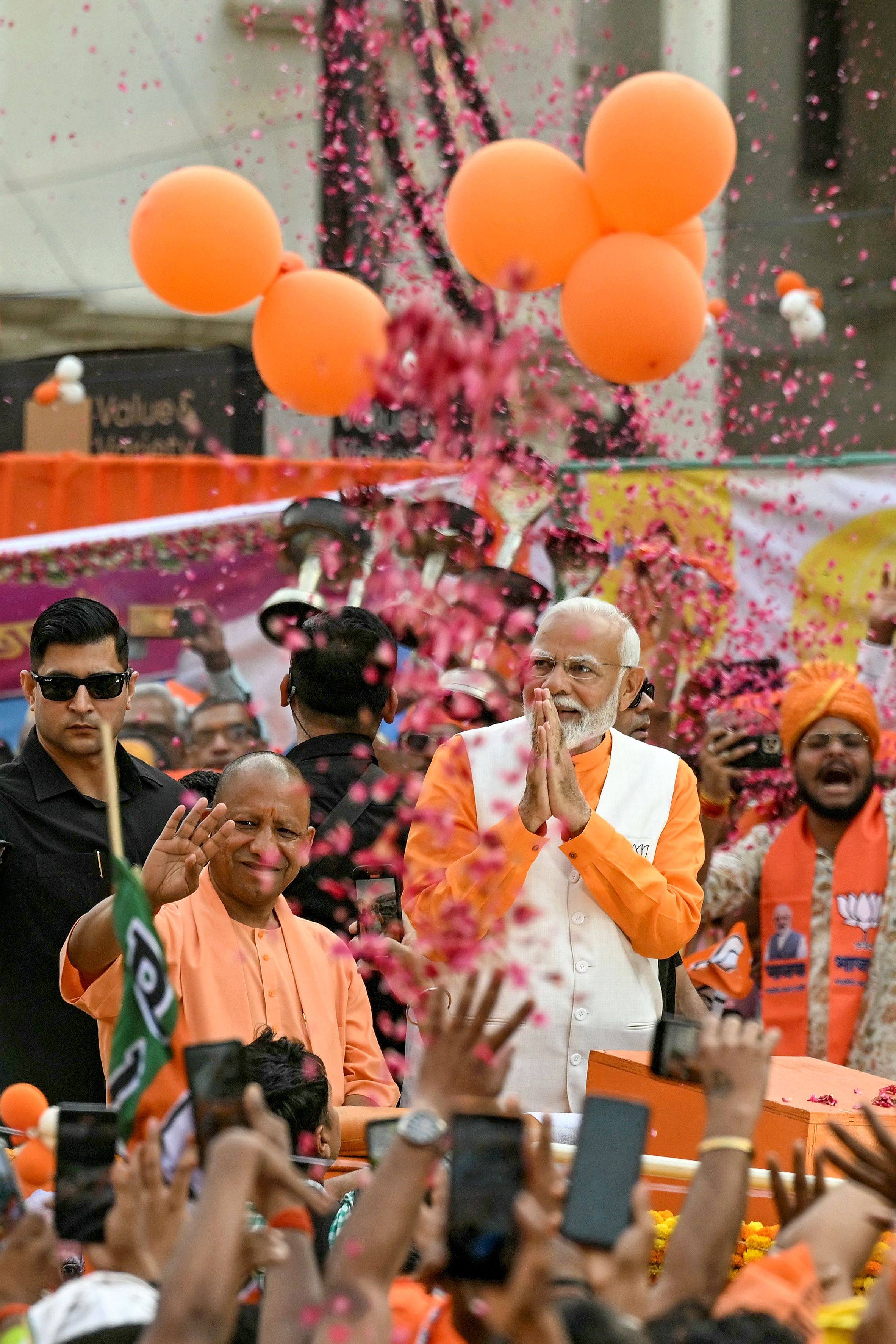 Indian Prime Minister Narendra Modi greets supporters during an election roadshow on Monday to rally votes from the Hindu faithful in Varanasi, one of India’s holiest cities. Photo: AFP 