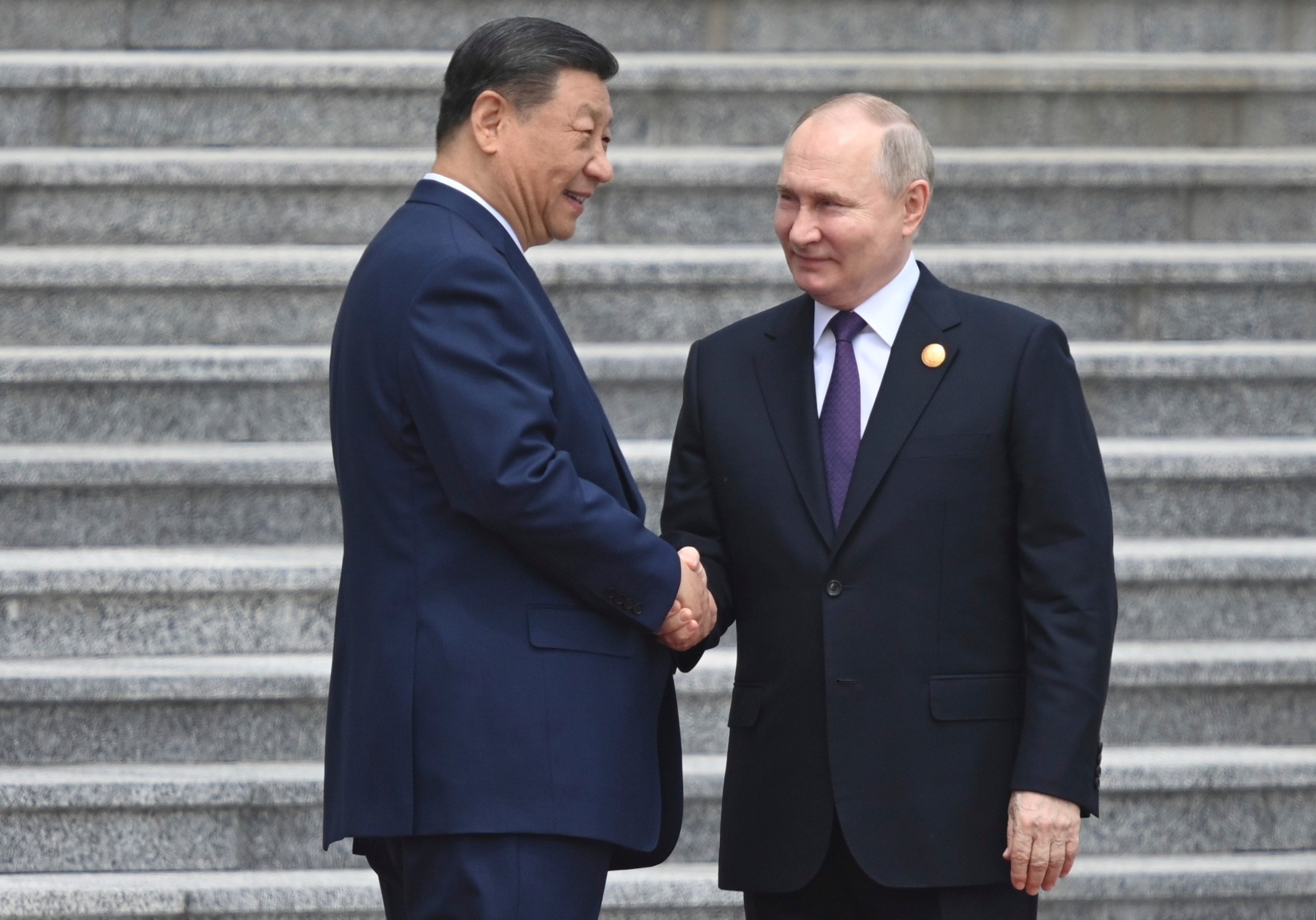 Chinese President Xi Jinping and Russian President Vladimir Putin shake hands during their meeting in Beijing, China, on May 16, 2024. Photo: AP