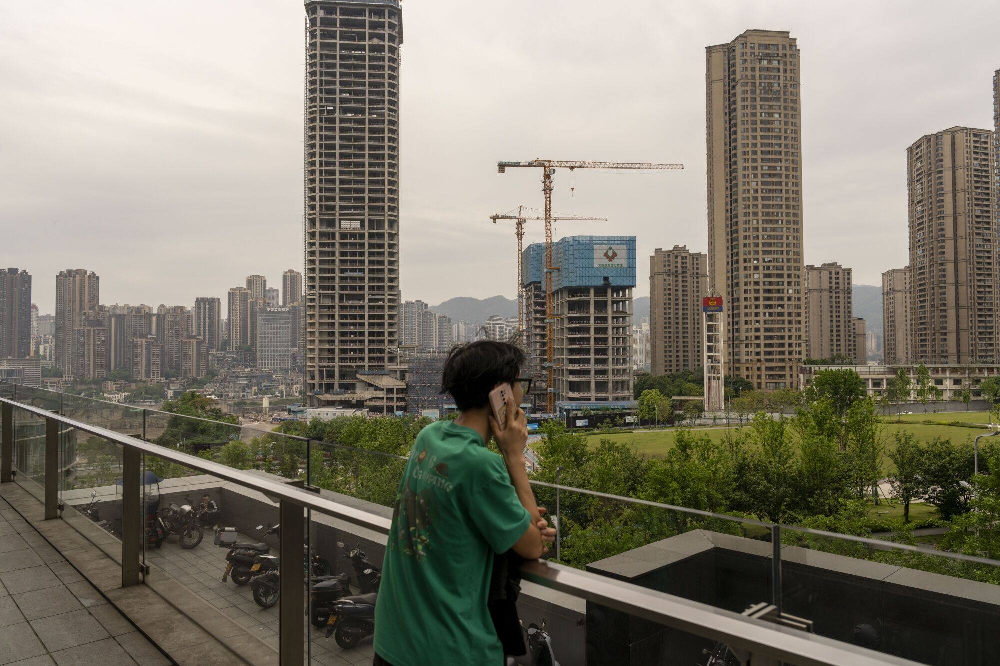 Buildings under construction in Chongqing. China is taking measures to tackle a protracted housing crisis. Photo: Bloomberg