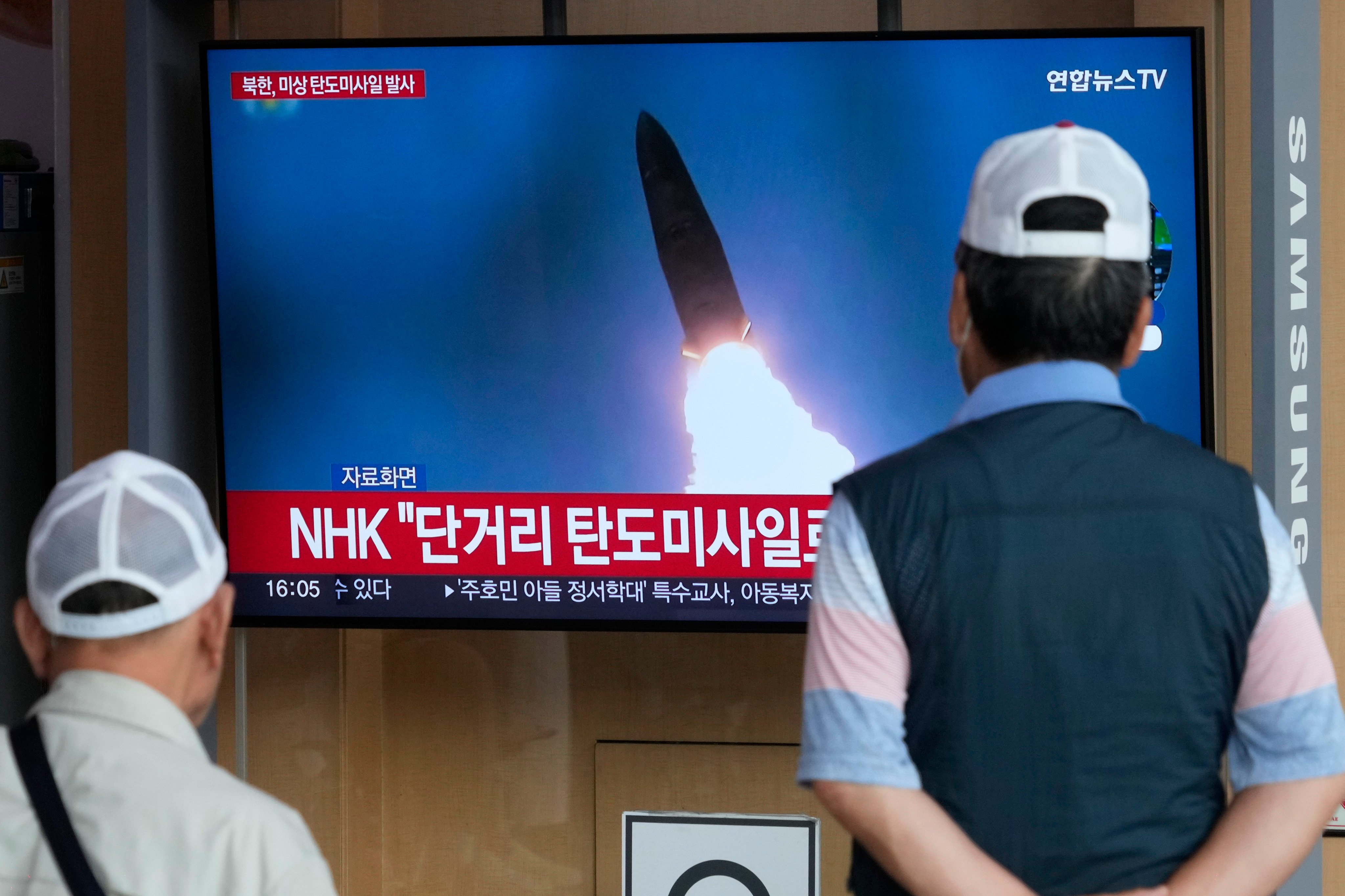 A TV screen shows a file image of North Korea’s missile launch during a news program at the Seoul Railway Station in Seoul, South Korea on Friday. Photo: AP
