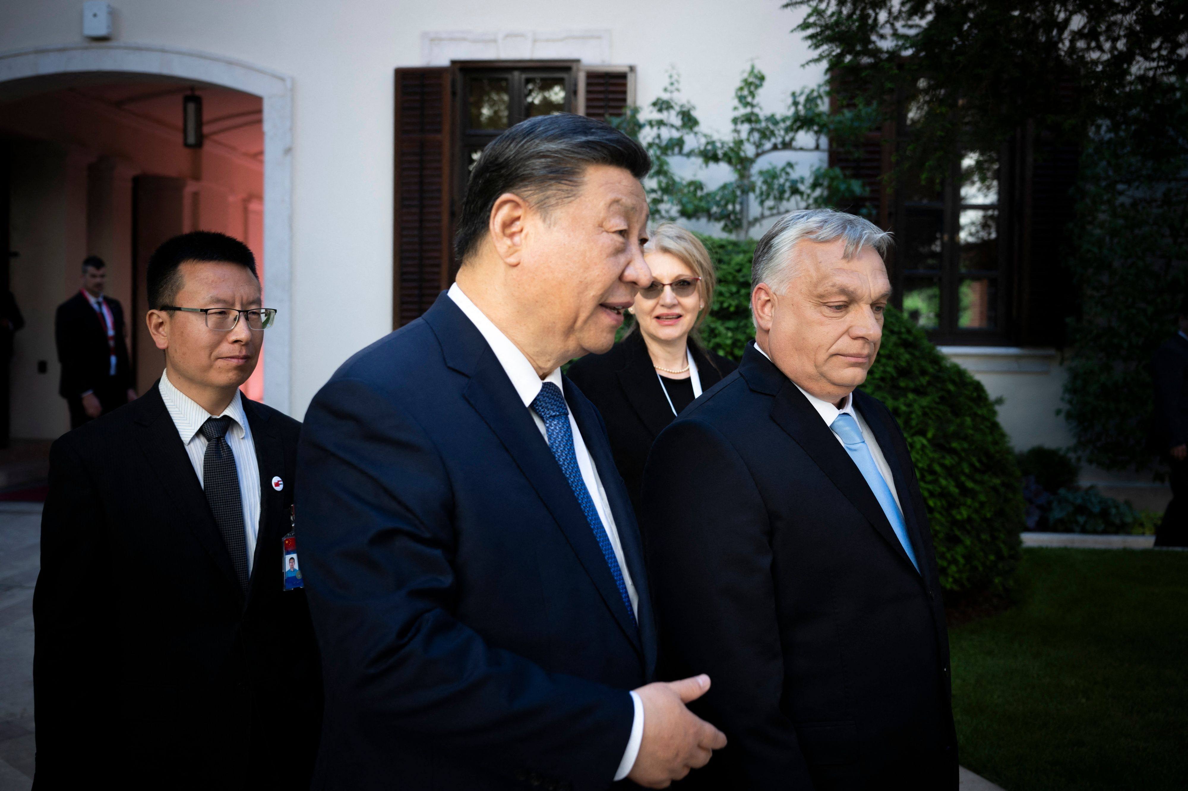 Chinese President Xi Jinping walks with Hungarian Prime Minister Viktor Orban before their talks in the prime minister’s office, the former Carmelite Monastery, in Budapest on May 9. Photo: AFP