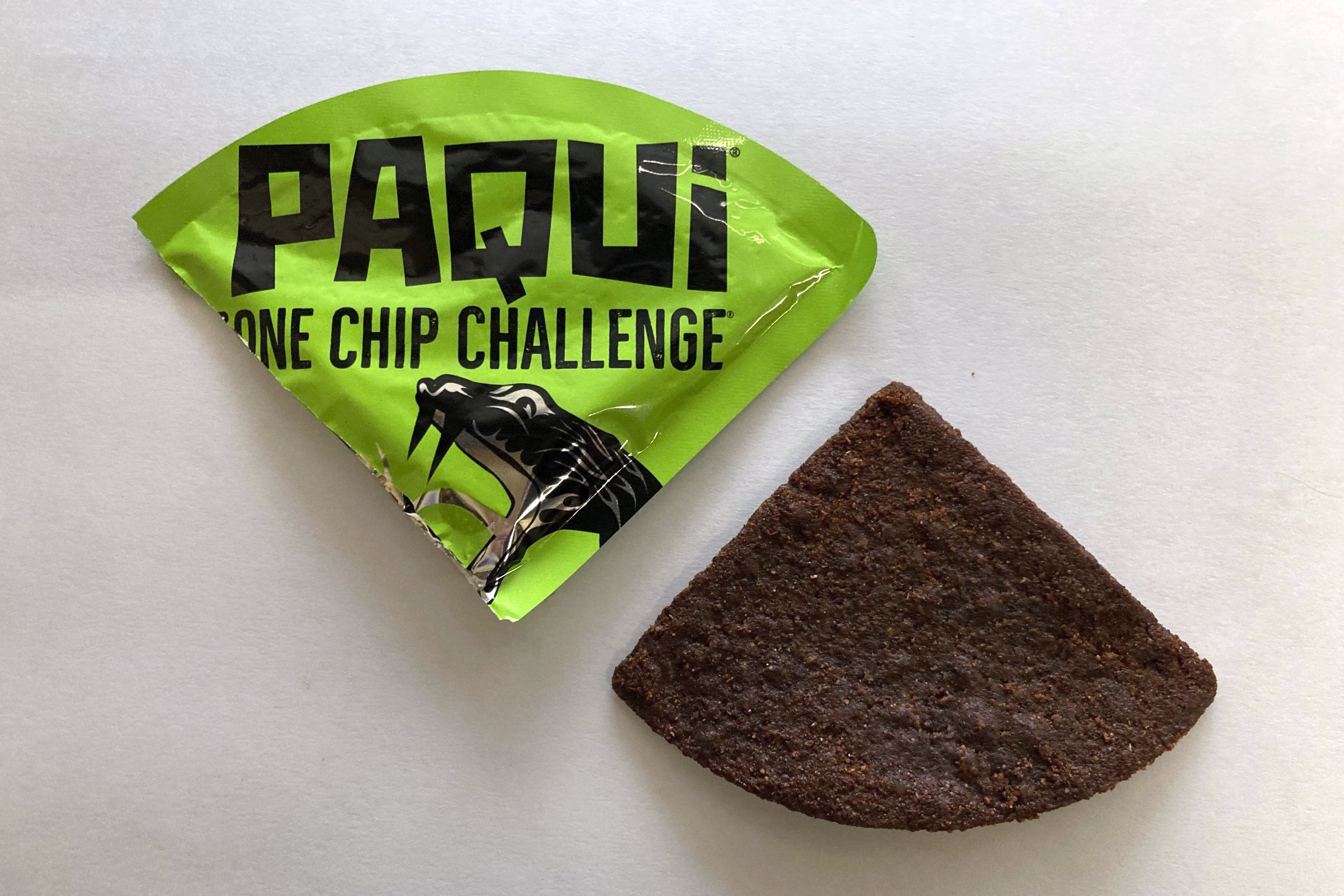 A Paqui One Chip Challenge chip is displayed in Boston in September 2023. Photo: AP