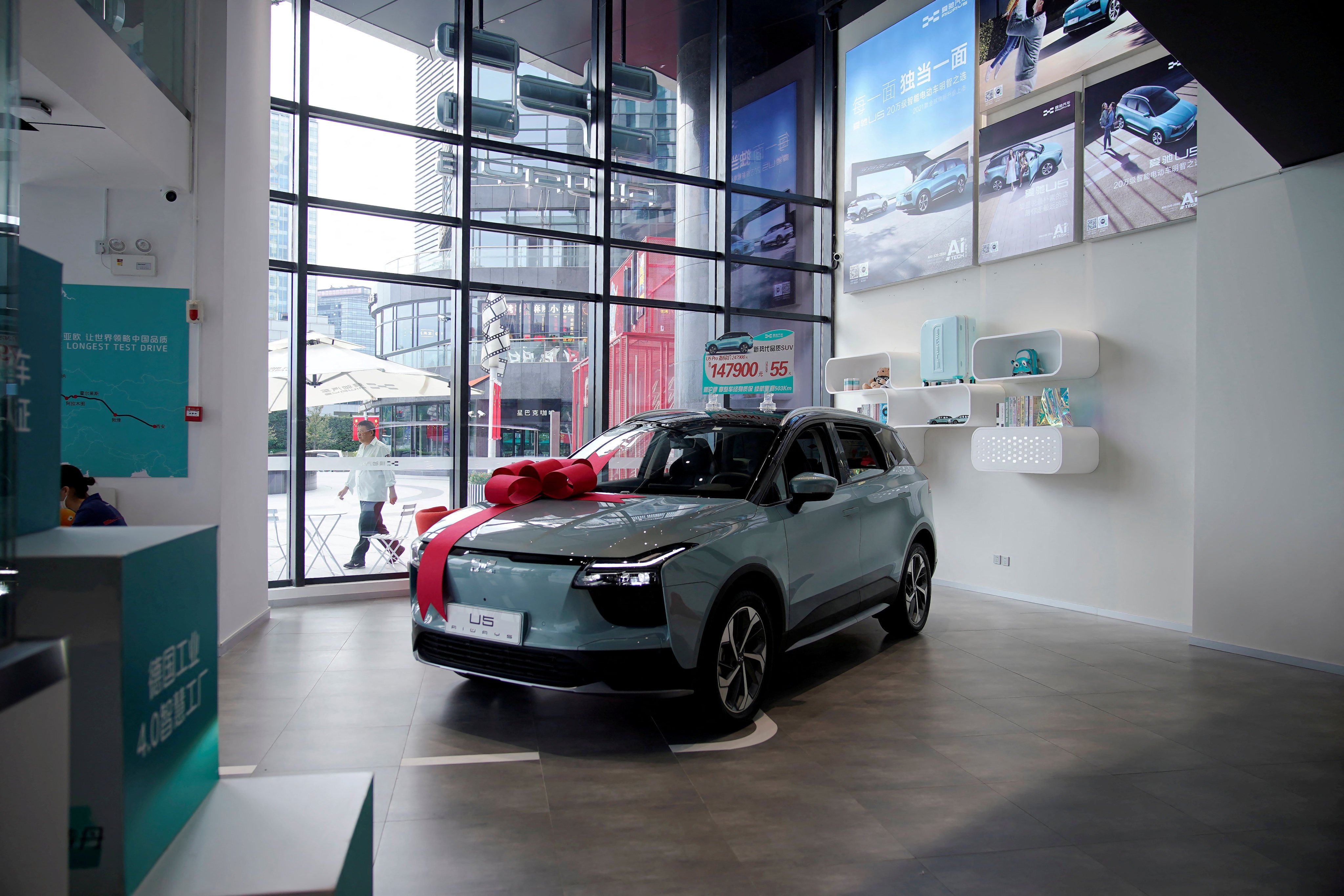 An Aiways U5 electric car on display at a company store in Shanghai. Photo: Reuters
