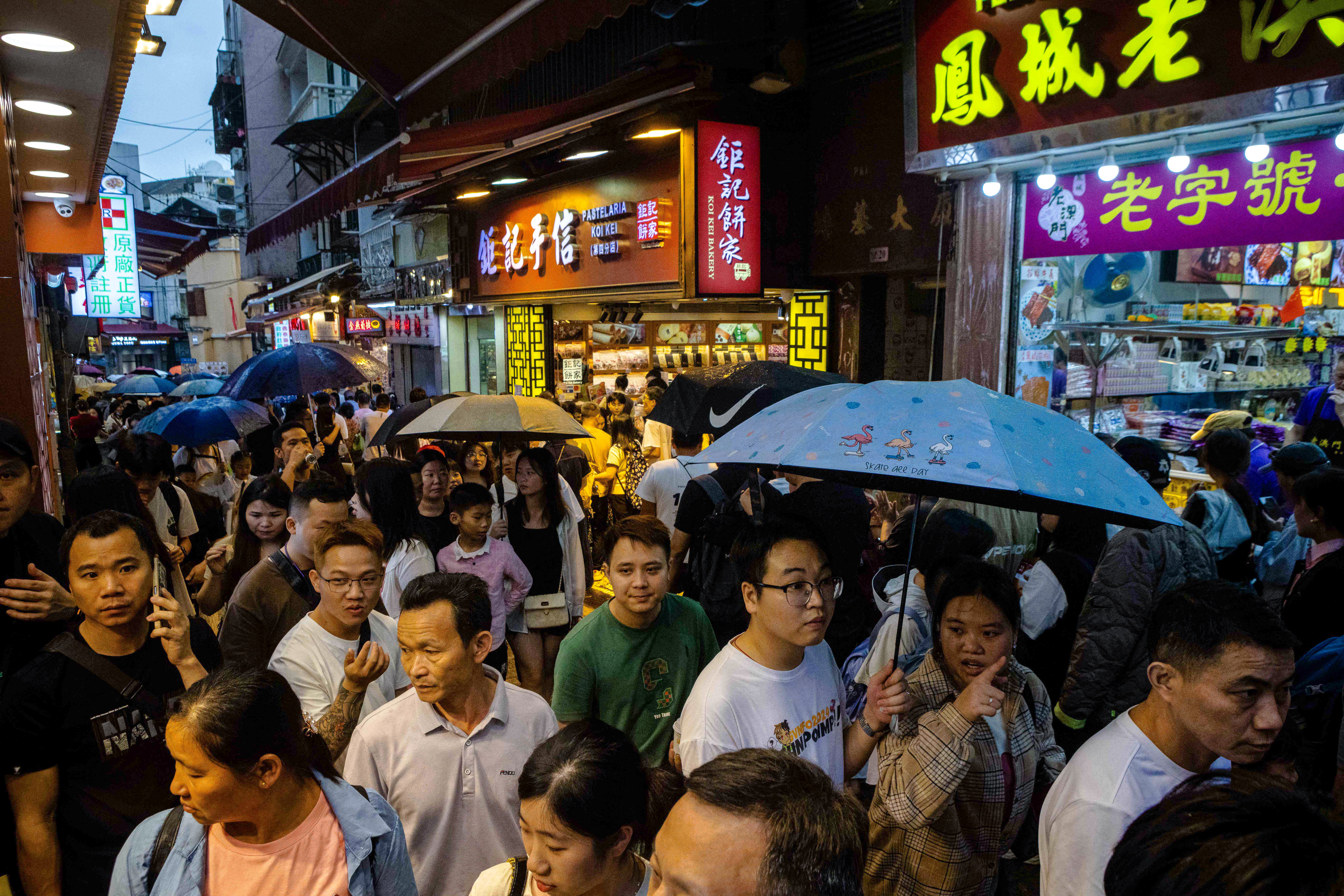 Visitors pack the streets of Macau during the recent Labour Day “golden week” holiday. Photo: AFP