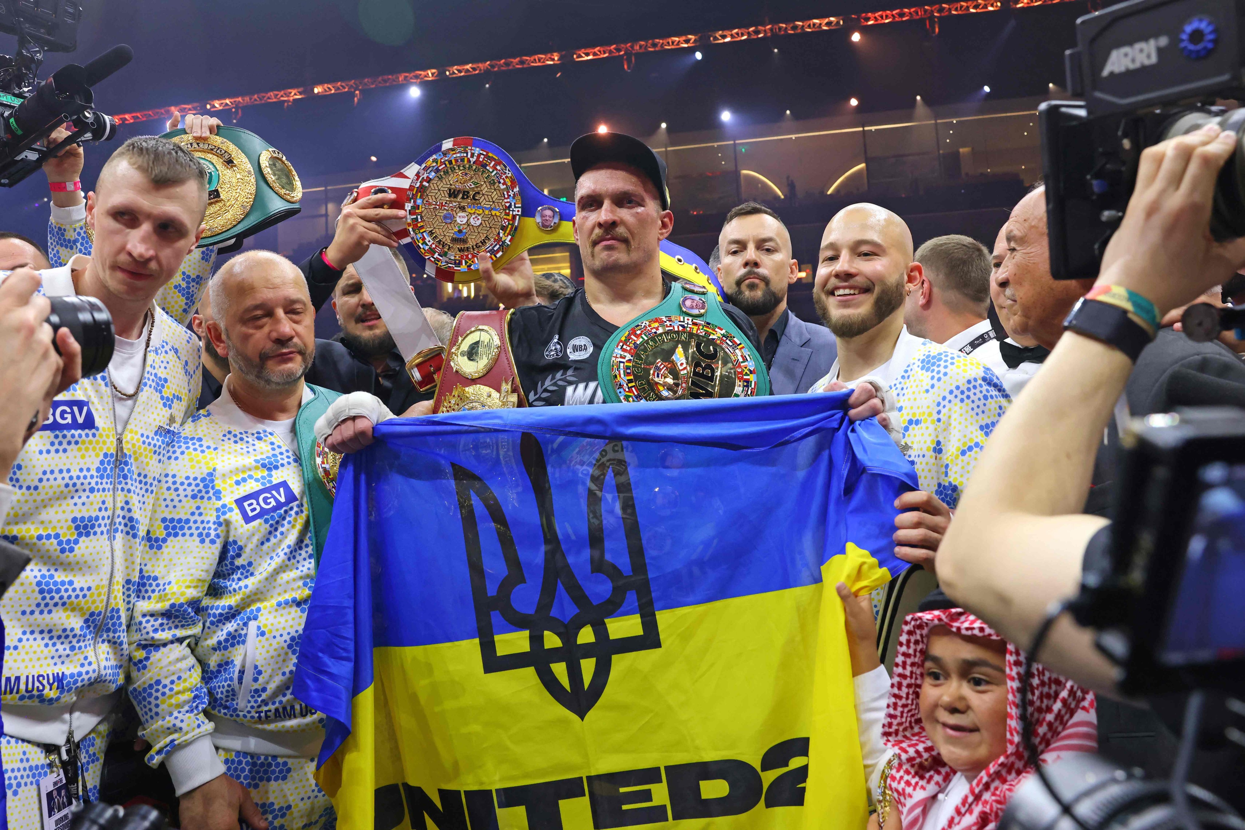 Ukraine’s Oleksandr Usyk (centre) celebrates his victory over Britain’s Tyson Fury at Kingdom Arena in Riyadh. Photo: AFP
