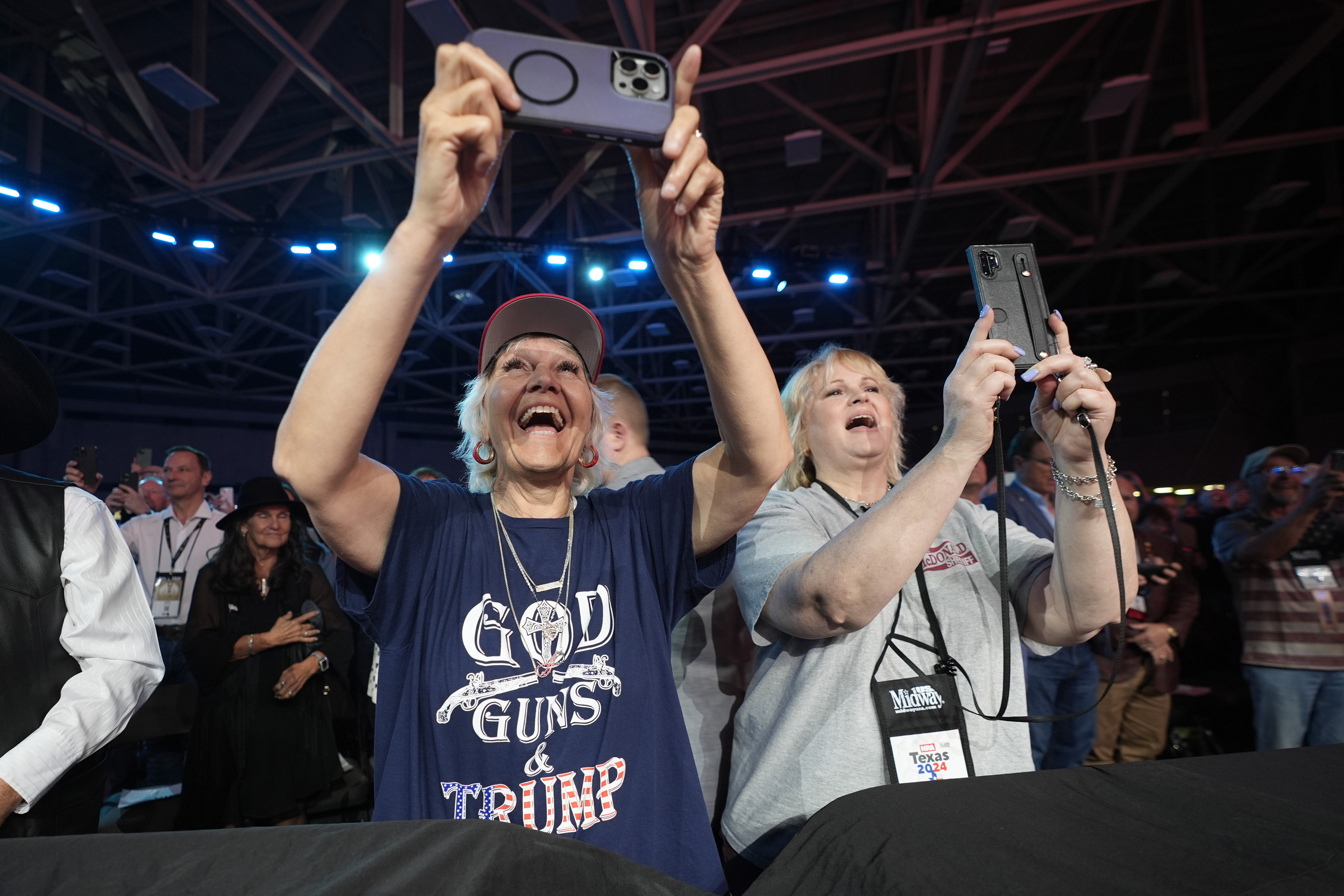 Supporters cheer for former president Donald Trump before he speaks at the National Rifle Association Convention on Saturday. Photo: AP