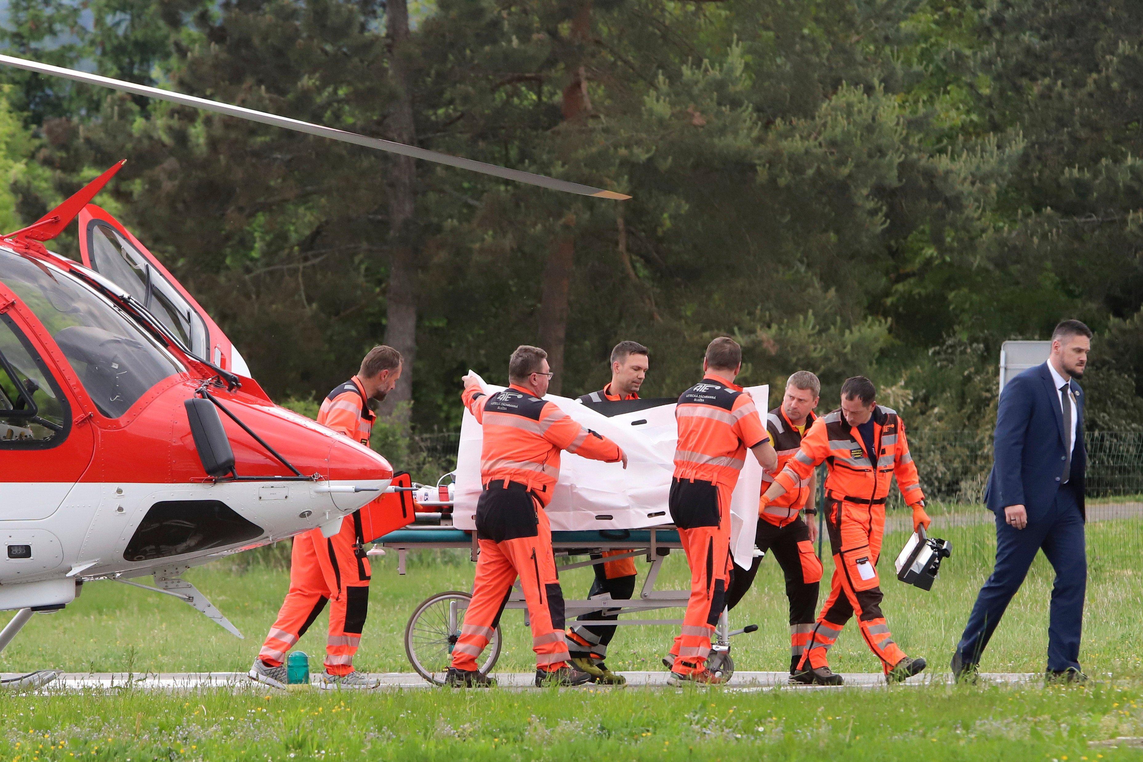 Rescue workers wheel Slovak Prime Minister Robert Fico, who was shot and injured, to a hospital on Wednesday. Photo: AP