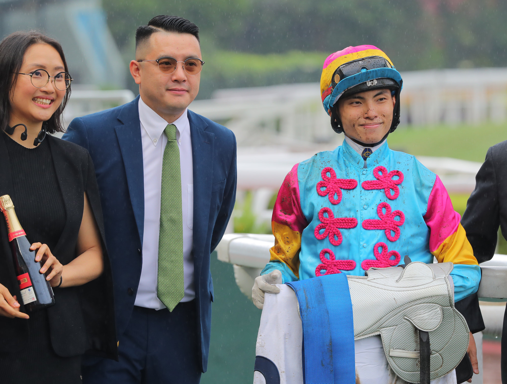 Pierre Ng (centre) and Ellis Wong (right) are all smiles after Taj Dragon’s success.