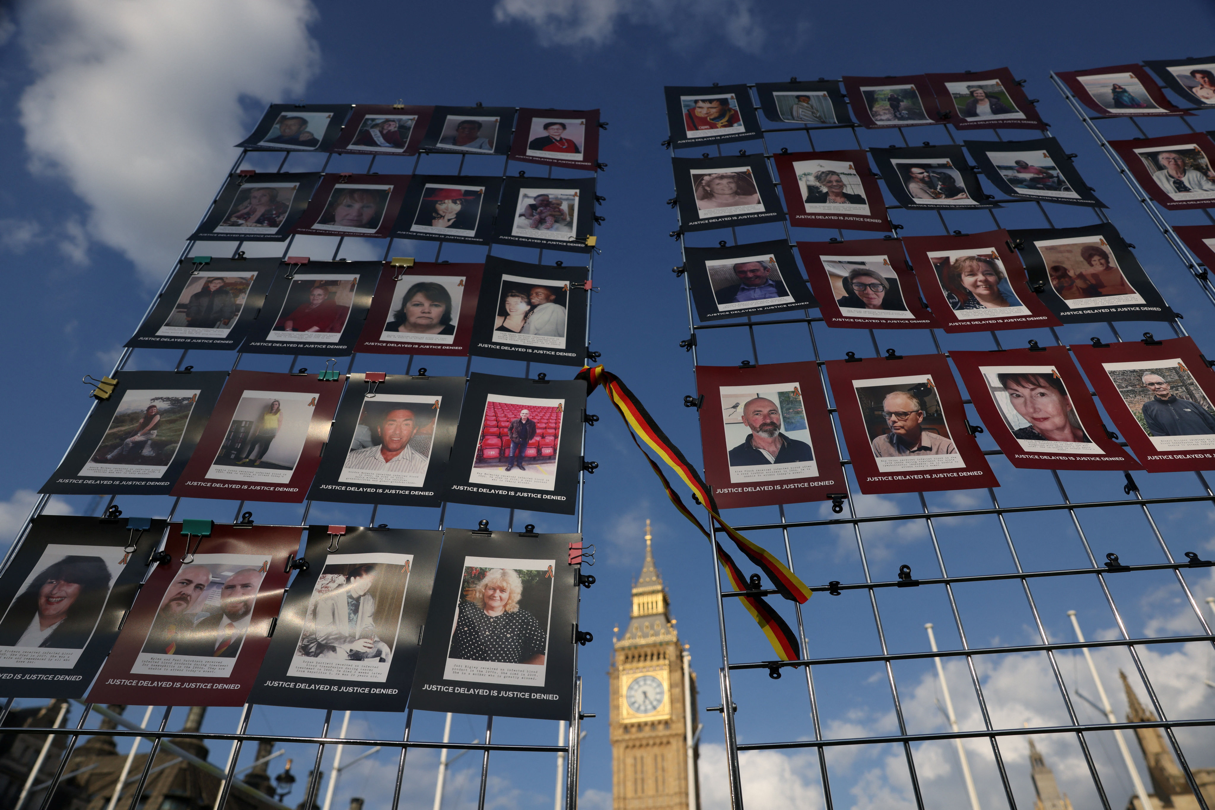 Images of victims of the contaminated blood scandal are displayed during a vigil to remember those that lost their lives, ahead of the release of final report of the Infected Blood Inquiry on Monday, in London. Photo: Reuters