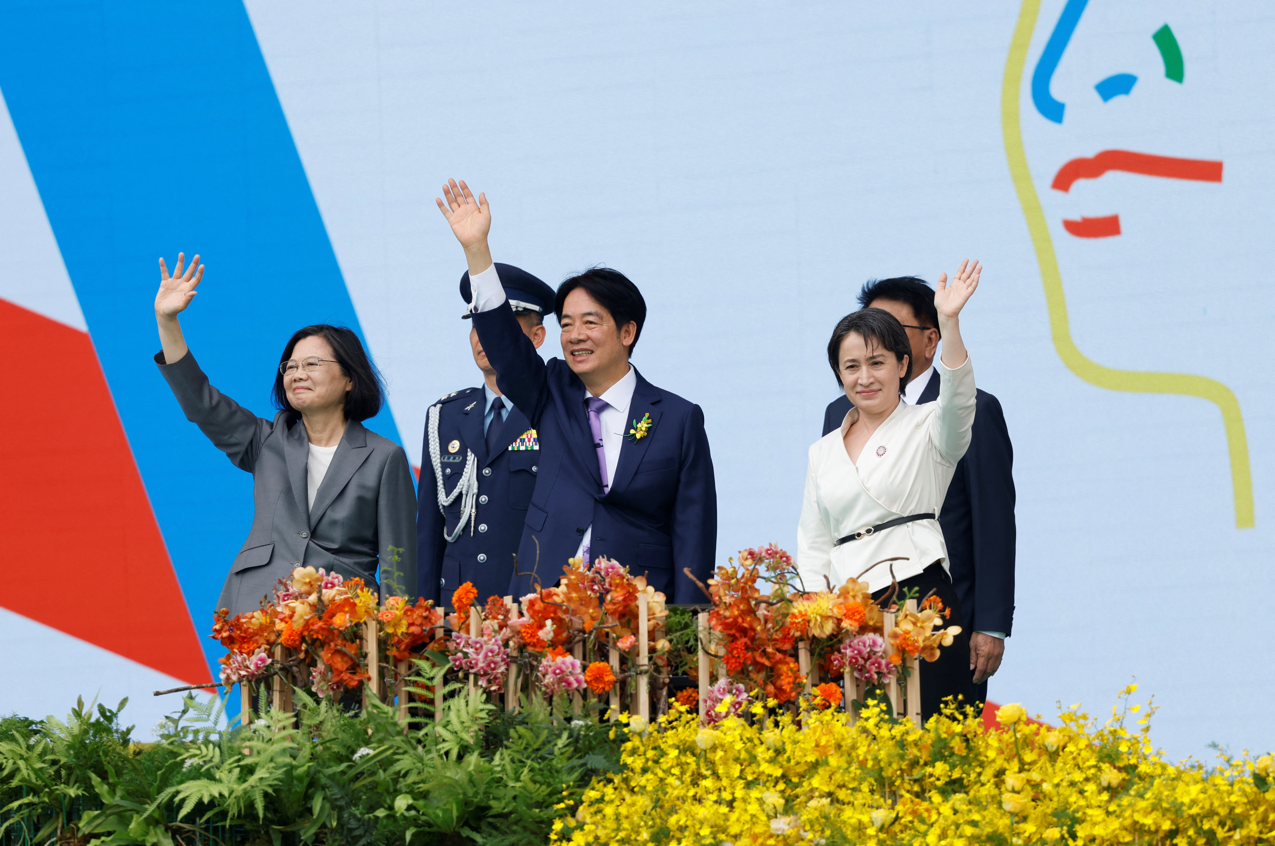 From left: former Taiwanese president Tsai Ing-wen with the island’s new leader William Lai Ching-te and his vice-president Hsiao Bi-khim wave during the inauguration ceremony on Monday. Photo: Reuters