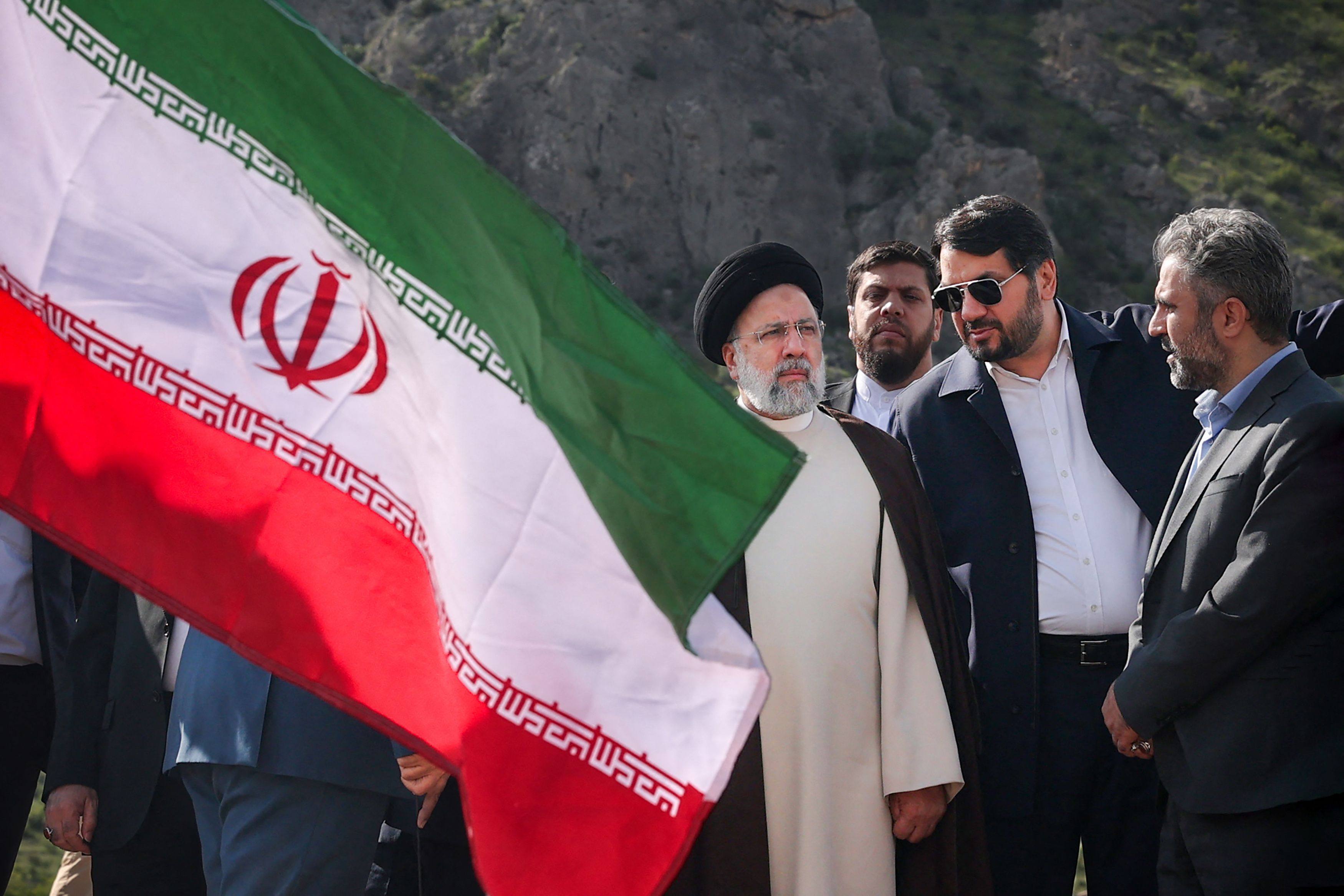 Iran’s President Ebrahim Raisi, left, at the site of Qiz Qalasi on the border of Iran and Azerbaijan on Sunday. Raisi’s helicopter was involved in “probable” accident later on Sunday. Photo: Iranian Presidency / AFP