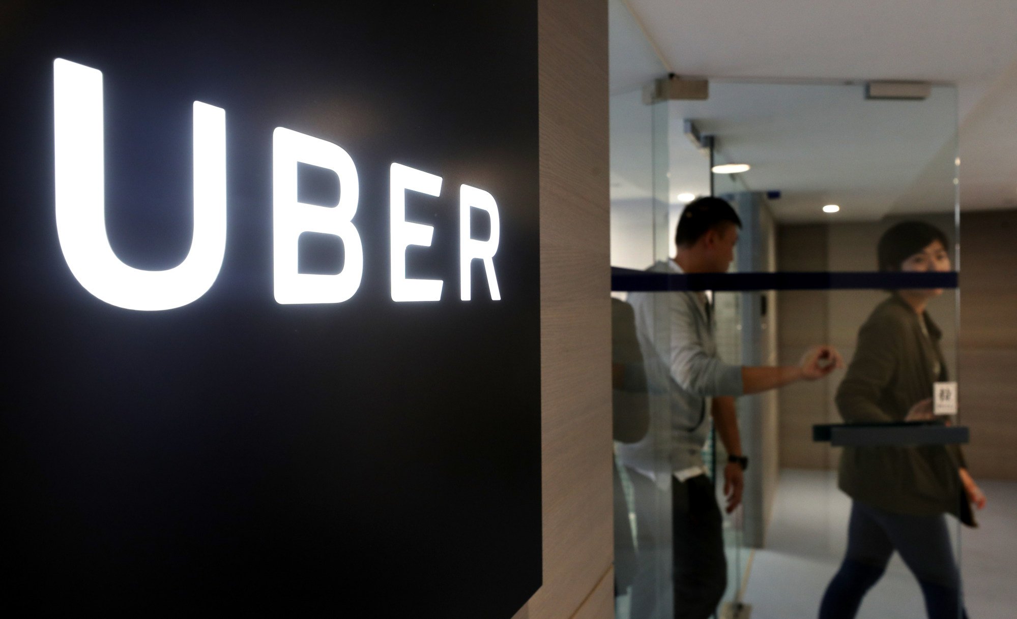 Uber says cabbies and ride-sharing coexist in other countries and it is ready to work towards a solution with the government and stakeholders. Photo: Winson Wong