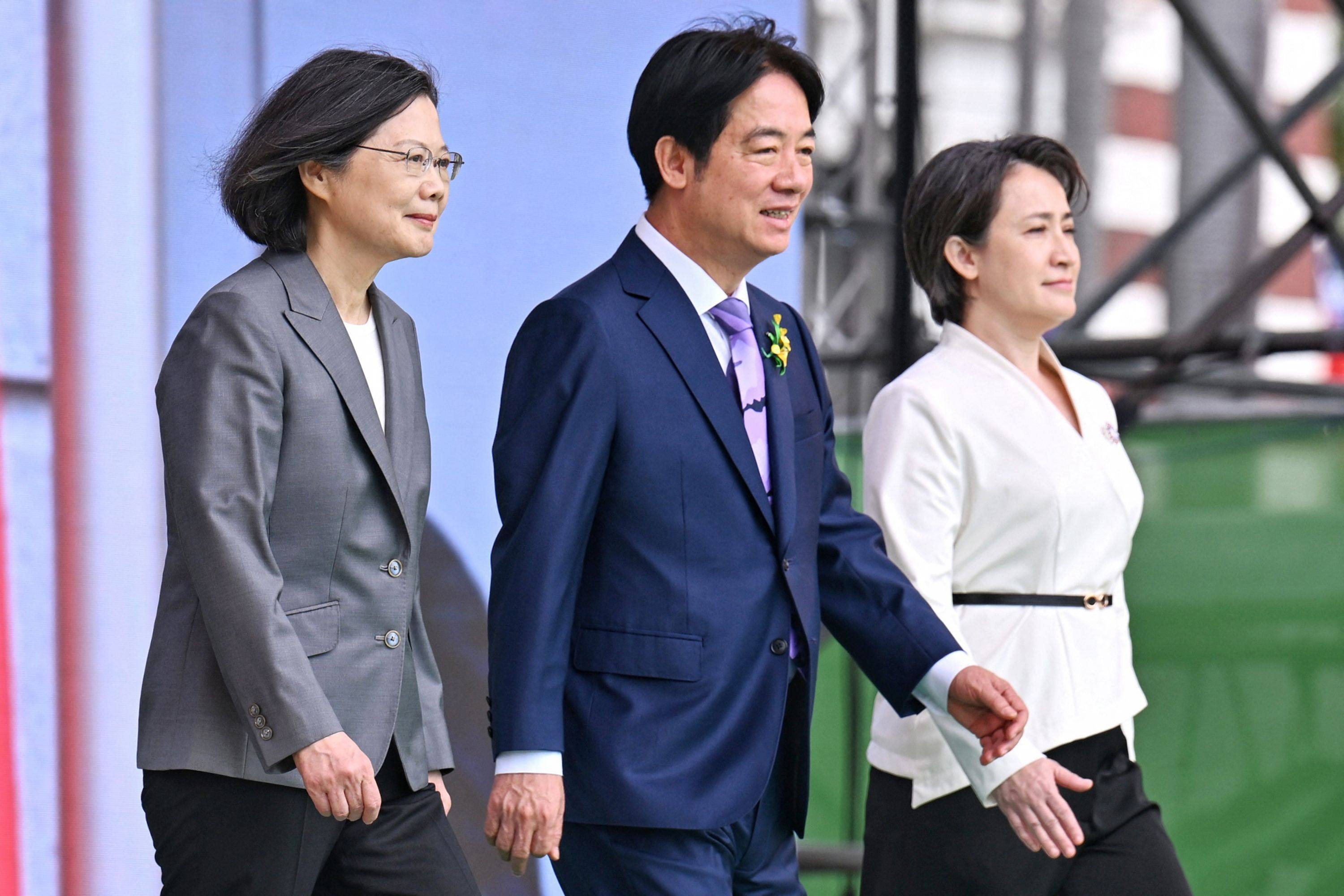 Taiwanese leader William Lai Ching-te (centre) is joined by his running mate Hsiao Bi-khim (right) and outgoing president Tsai Ing-wen (left) during his inauguration in Taipei on Monday. Photo: AFP