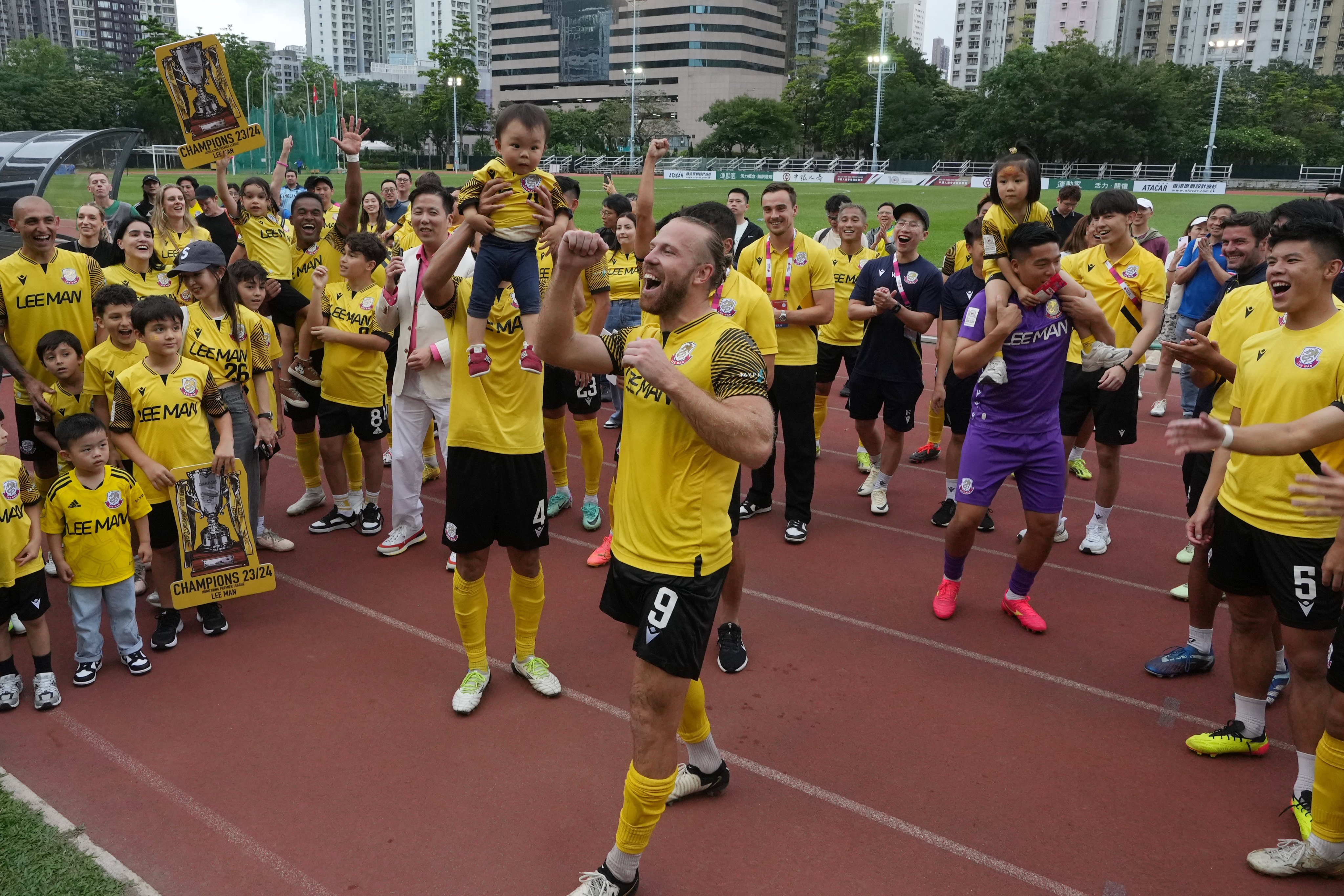Henri Anier leads the celebrations after Lee Man win their first Hong Kong Premier League title. Photo: Elson Li
