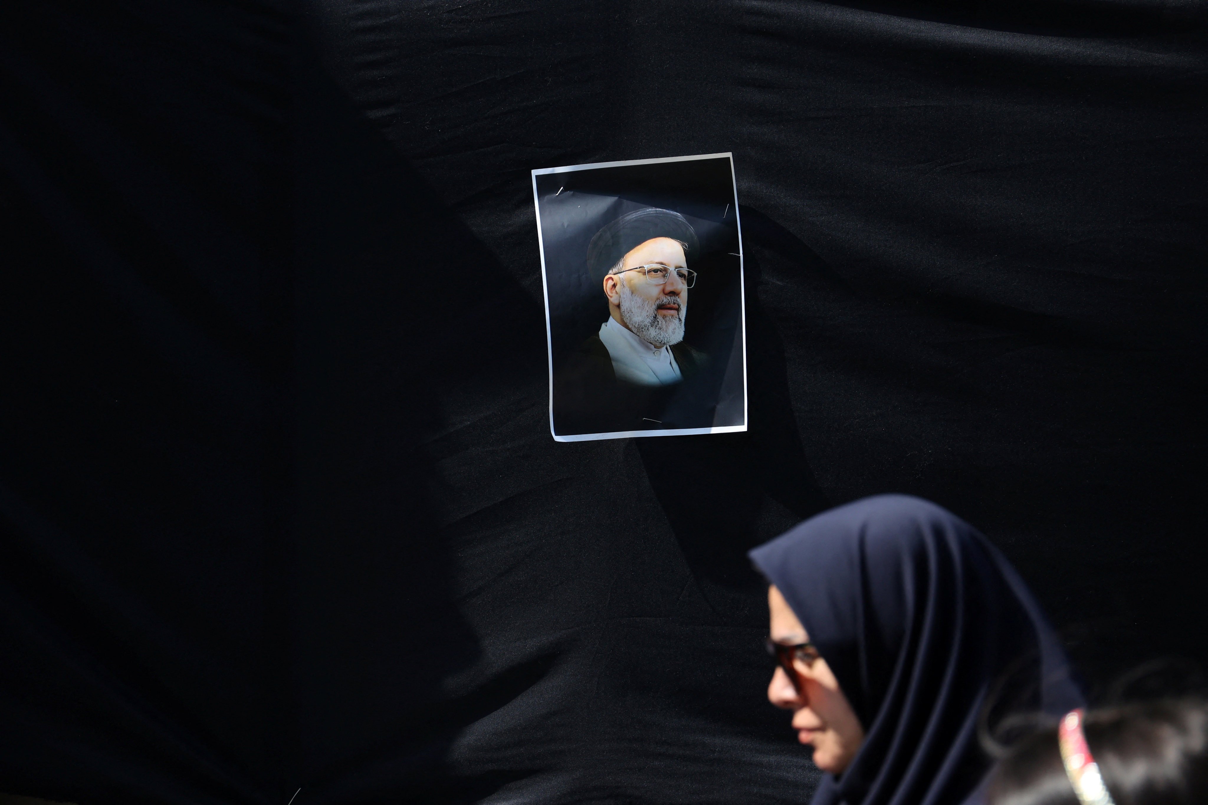 A picture of the late Iran’s President Ebrahim Raisi is seen on a street in Tehran, Iran, on Monday. Photo: West Asia News Agency via Reuters