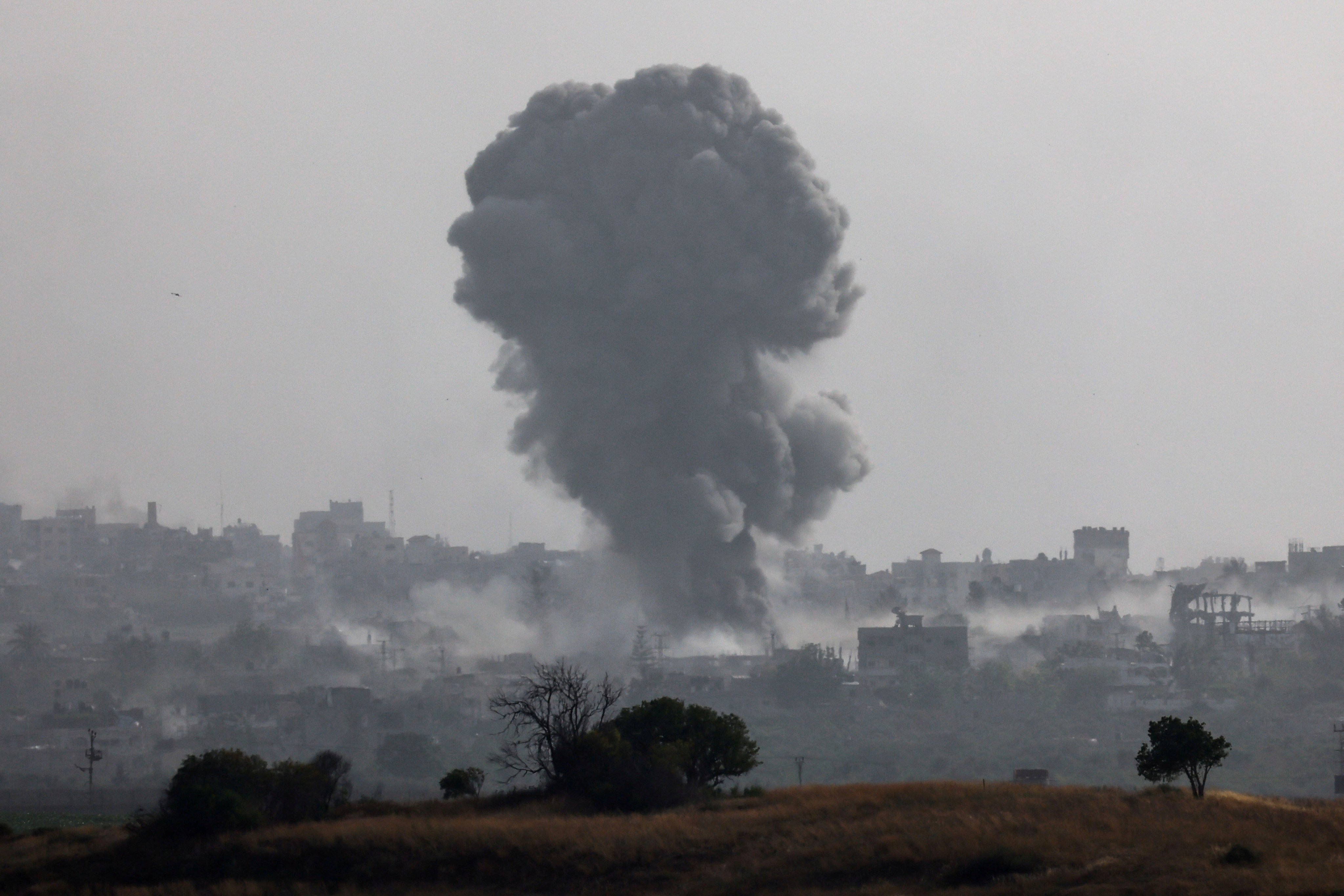 Smoke rises following an air strike in Gaza on Monday. Photo: Reuters