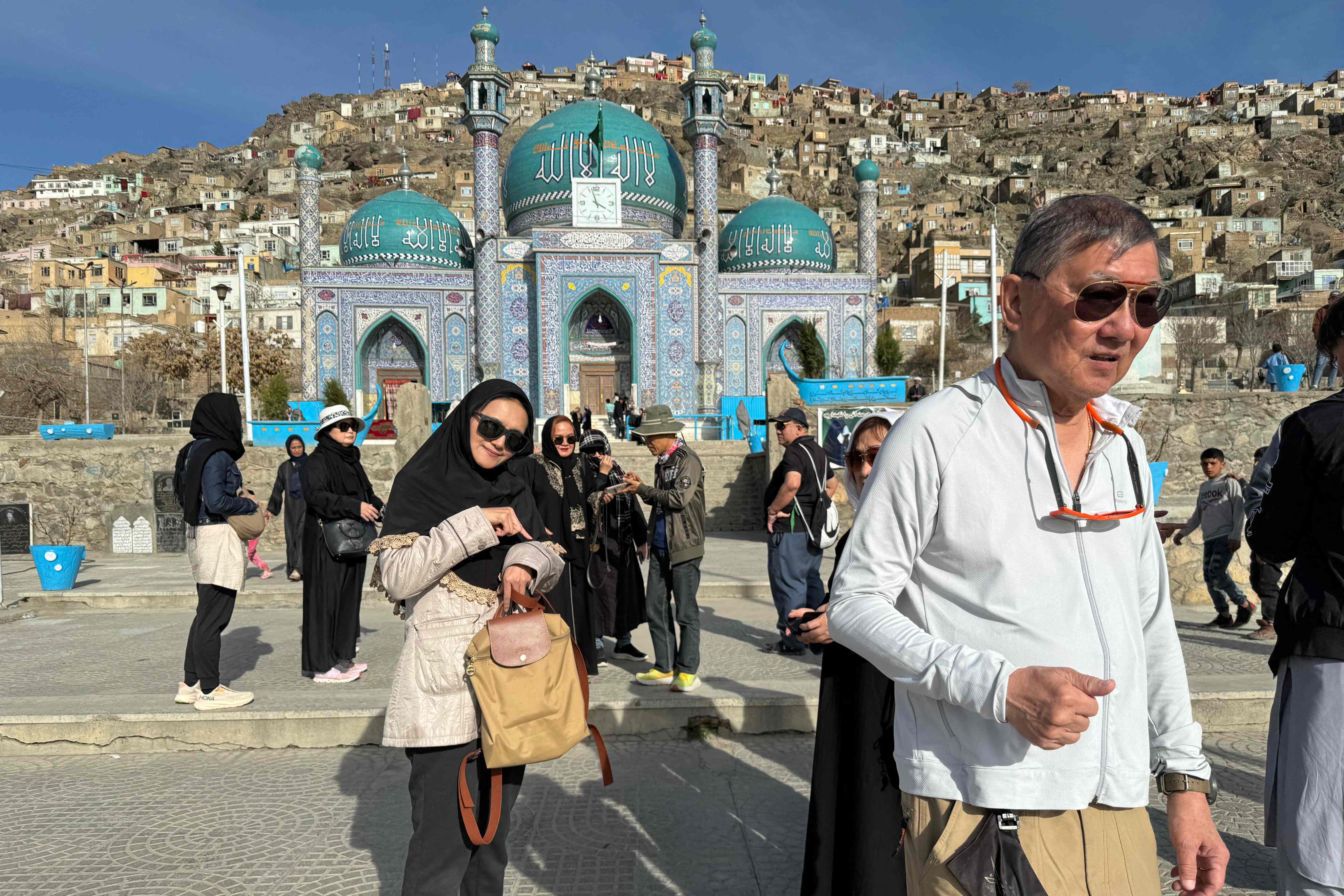 Thai tourists visit the Kart-e-Sakhi Shrine in Kabul, Afghanistan, in March 2024. The killing by terrorists of three Spanish tourists in an attack on a market threatens the future of the country’s tourism industry. Photo: AFP