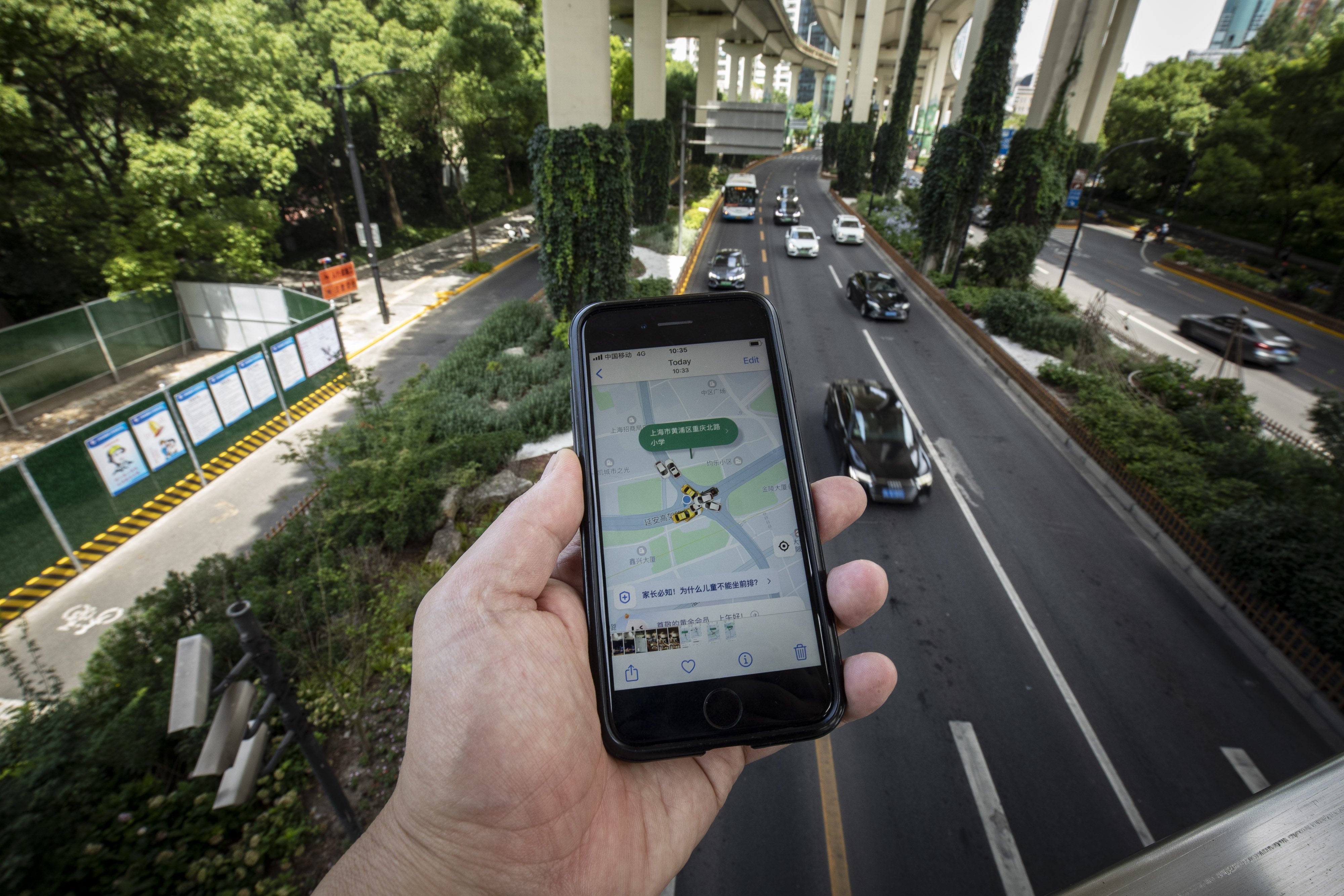 The Didi ride-hailing app on a smartphone arranged in Shanghai, China, June 27, 2022. Photo: Bloomberg