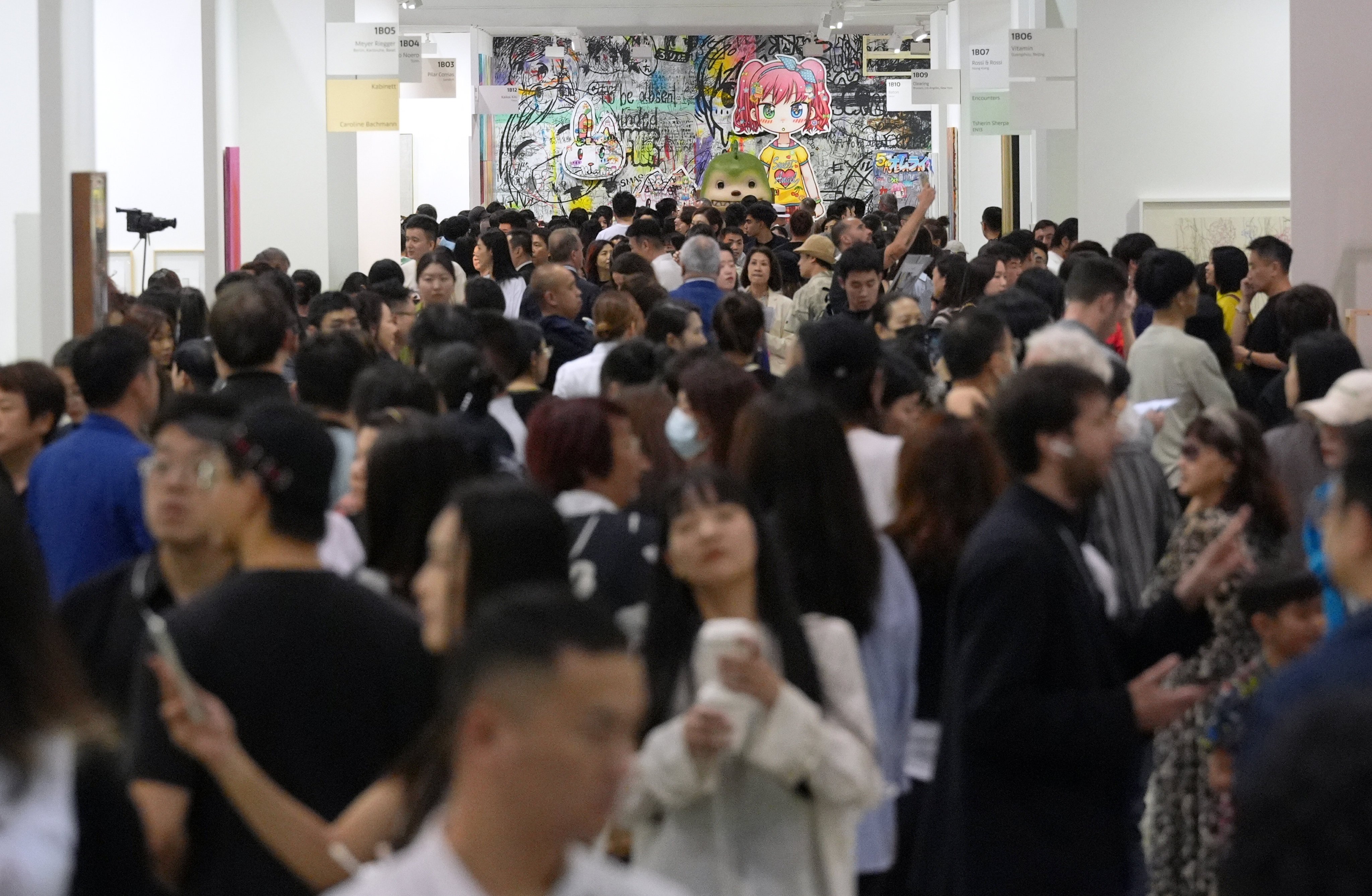 Visitors packed the Art Basel event at Hong Kong Convention and Exhibition Centre in Wan Chai on March 28. Photo: Eugene Lee