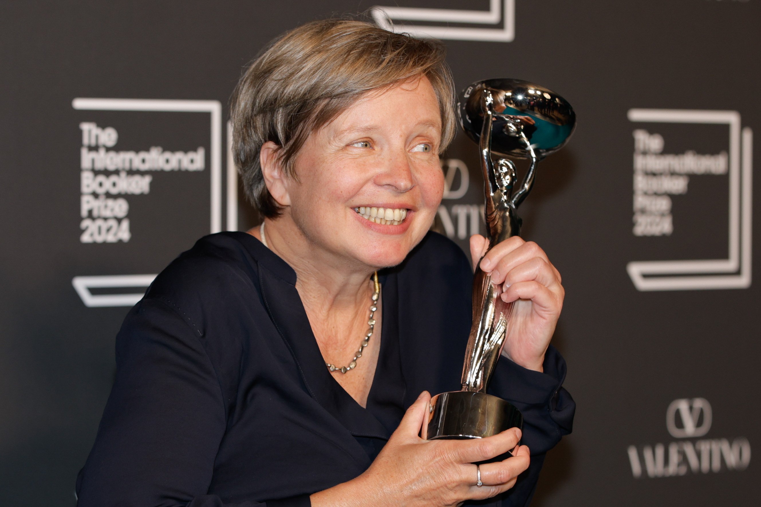 Jenny Erpenbeck, author of “Kairos”, poses for photographers after winning the 2024 International Booker Prize in London on Tuesday. Photo: EPA-EFE