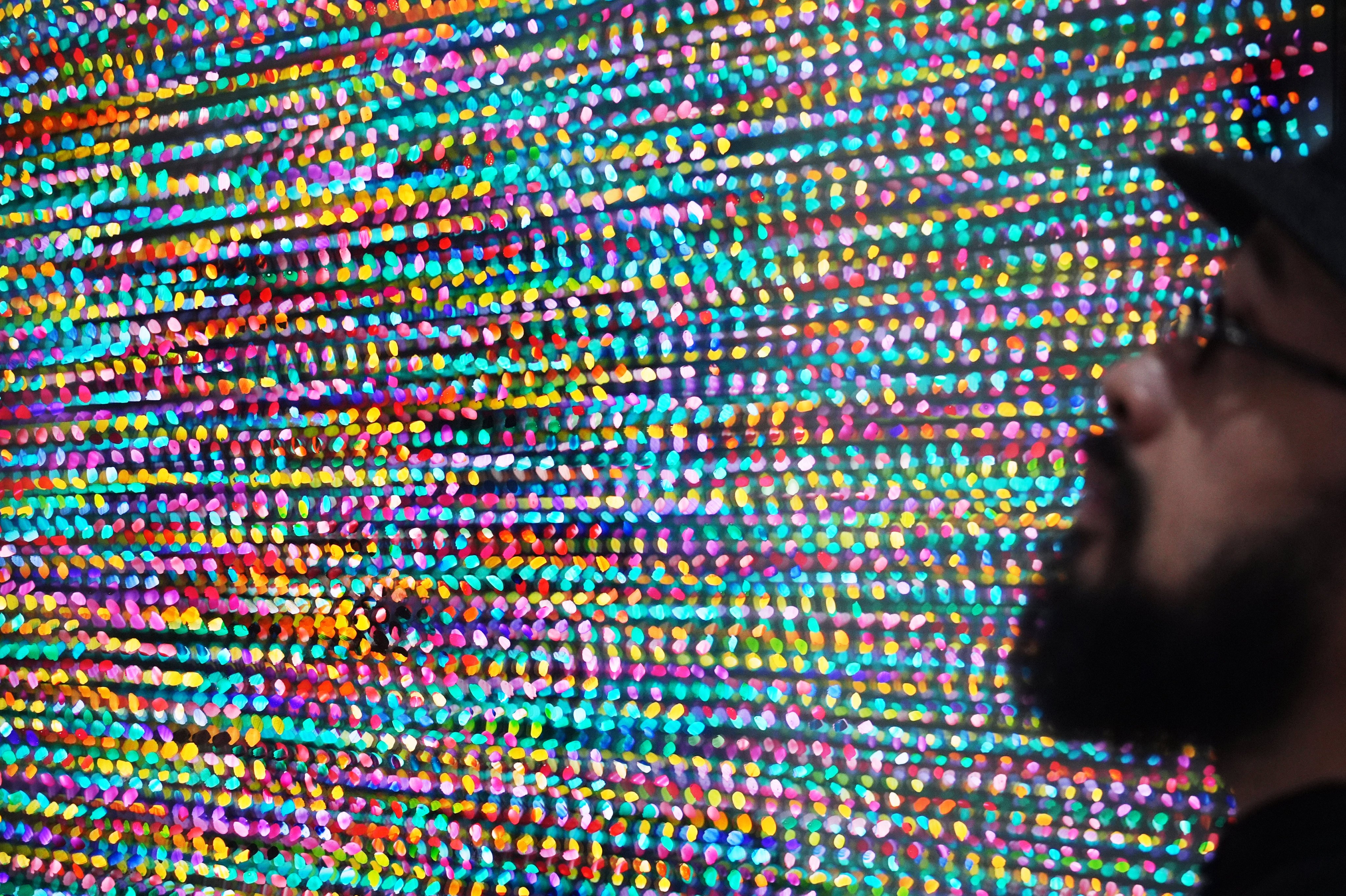 A visitor admires the artwork “Lepton II” by Ivan Navaro at Art Basel 2024 at the Hong Kong Convention and Exhibition Centre in Wan Chai in March. Photo: Eugene Lee