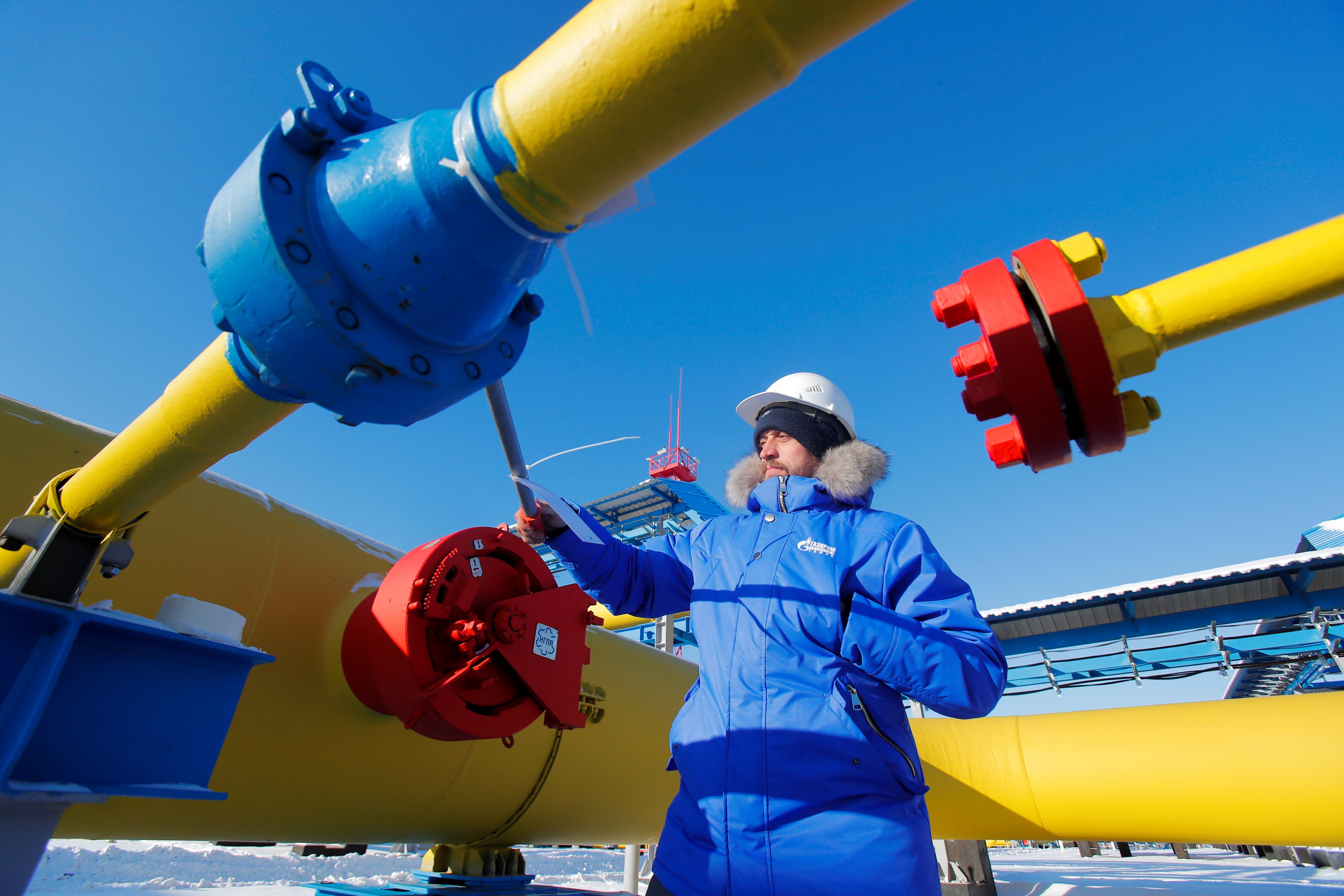 An employee checks a gas valve at the Atamanskaya compressor station, part of Gazprom’s Power Of Siberia gas pipeline in Russia’s Amur region on November 29, 2019. Photo: Reuters