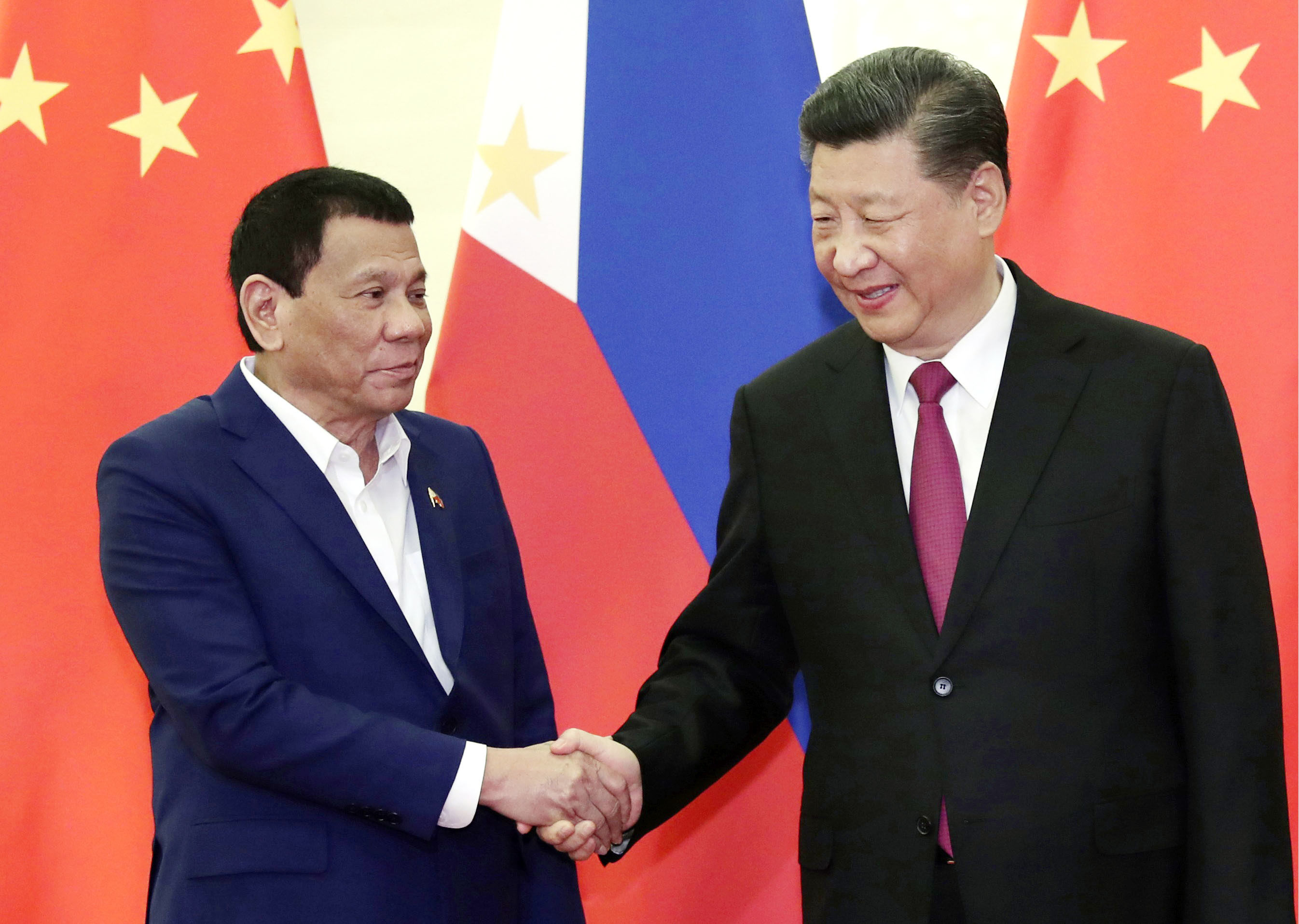 Philippine President Rodrigo Duterte shakes hands with Chinese President Xi Jinping before their talks in Beijing in April 2019. Photo: Kyodo
