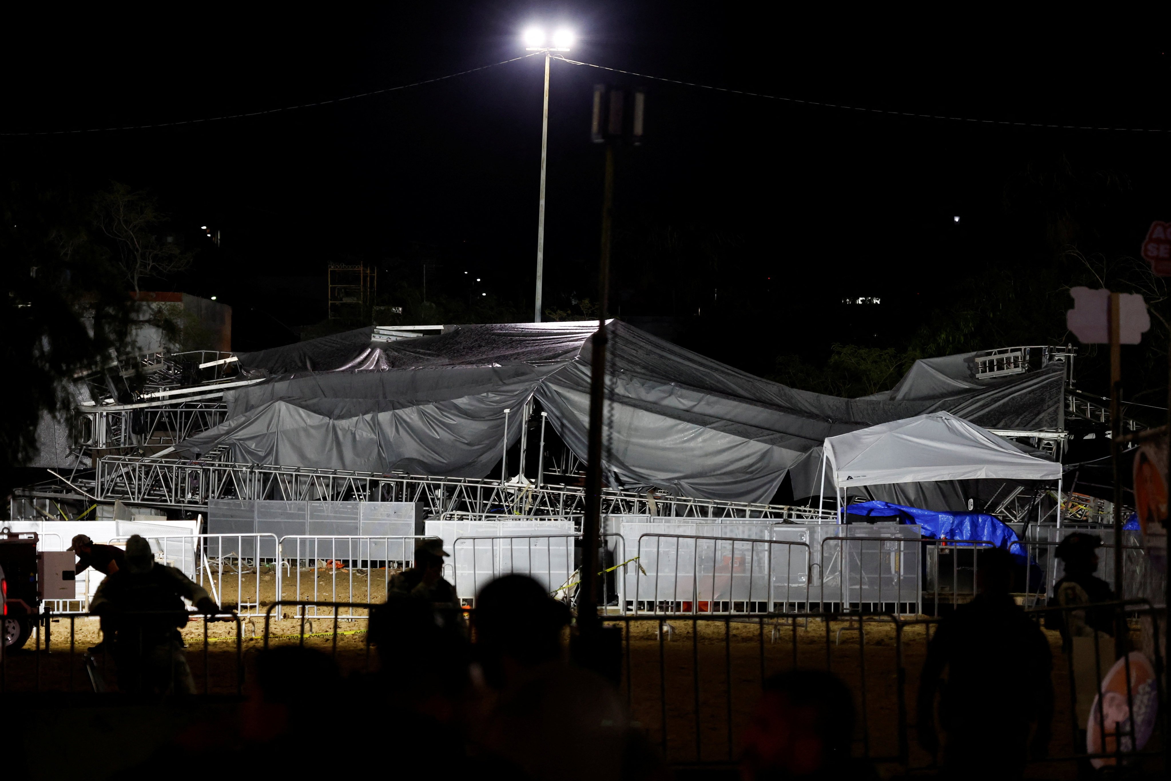 Part of the structure that collapsed at the campaign event. Photo: Reuters