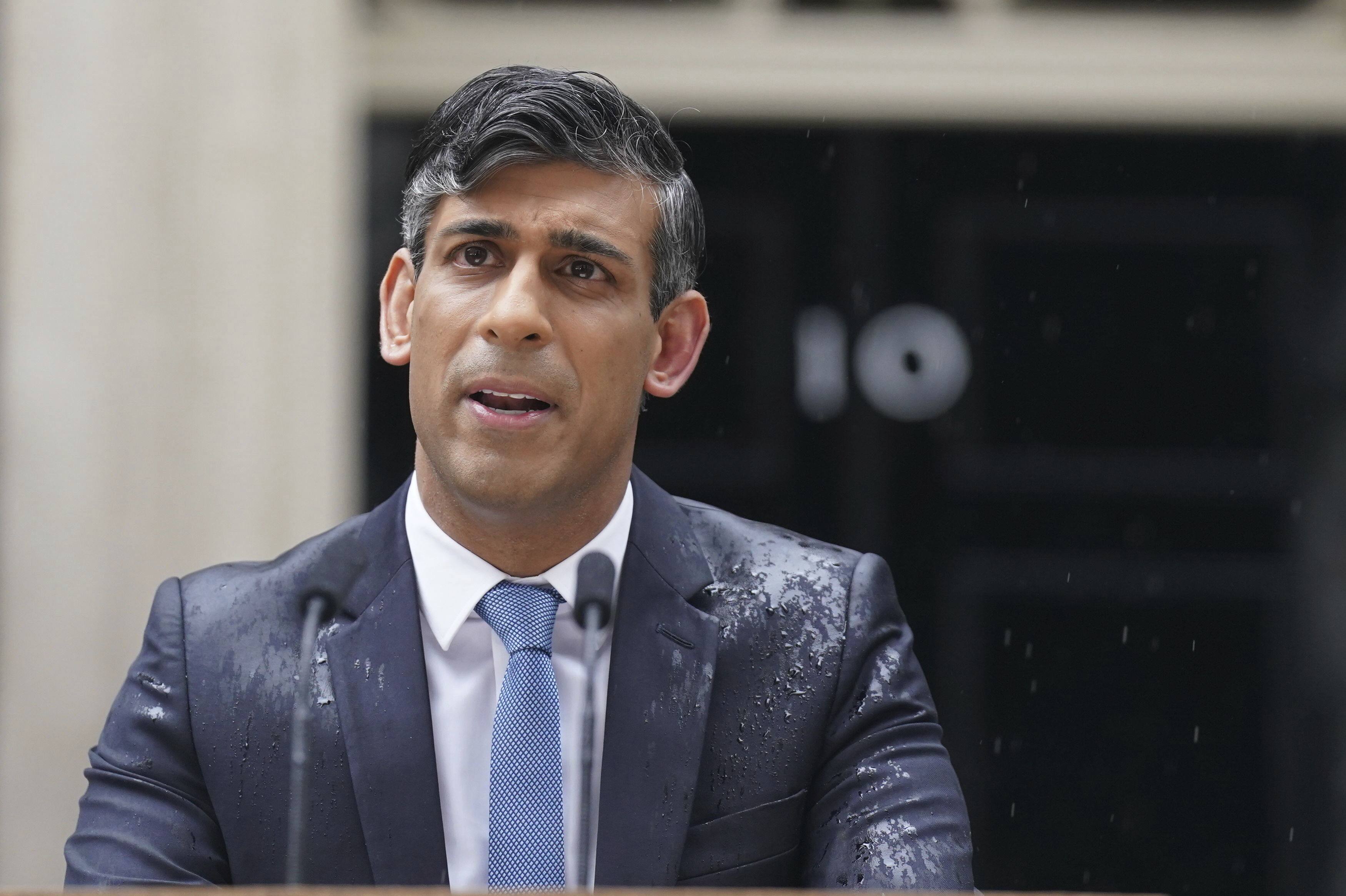 British Prime Minister Rishi Sunak delivers a speech outside No 10 Downing Street in London on Wednesday. Photo: PA via AP