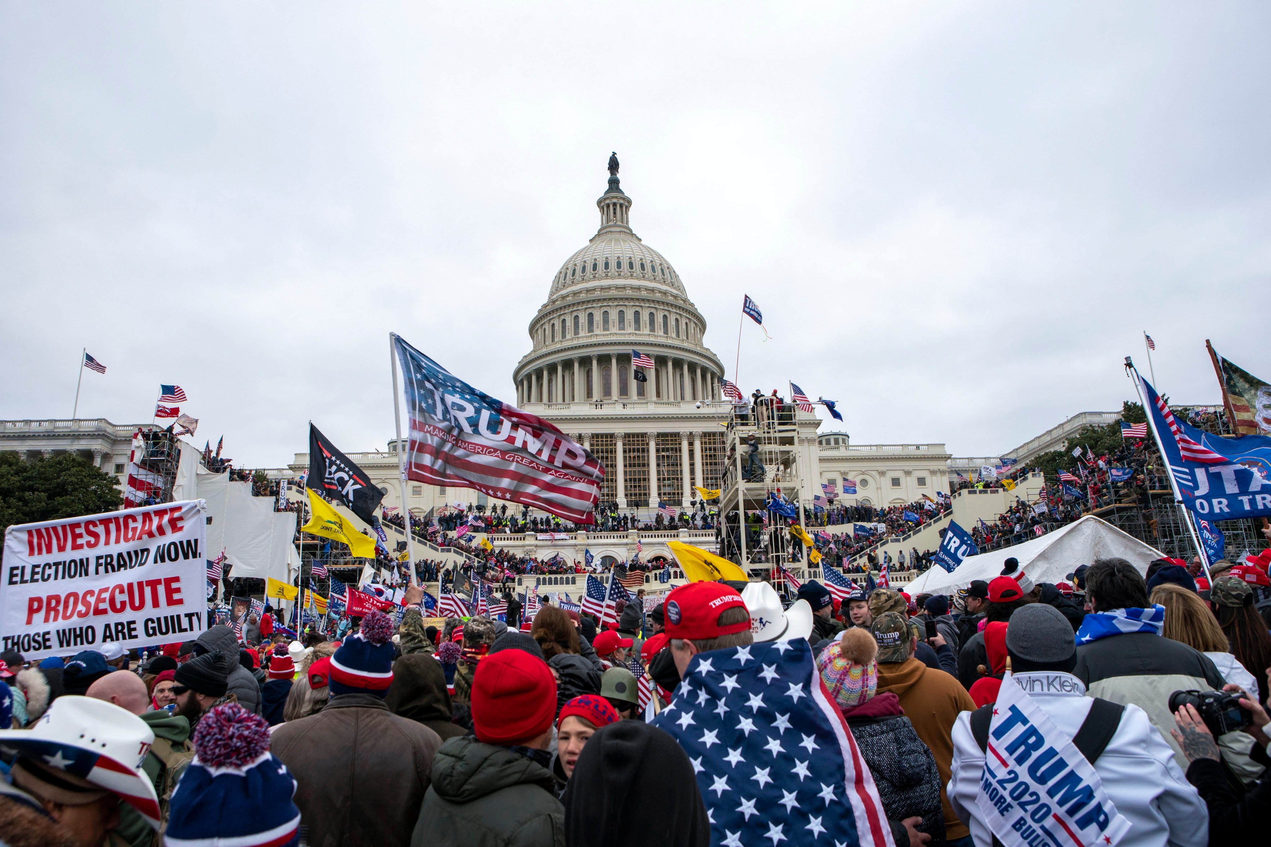 People loyal to then-US President Donald Trump rally at the US Capitol in Washington on January 6, 2021. Trump’s campaign to return to office has many voters concerned about potential chaos and election violence, but investors and fund managers appear to have no such fears. Photo: AP