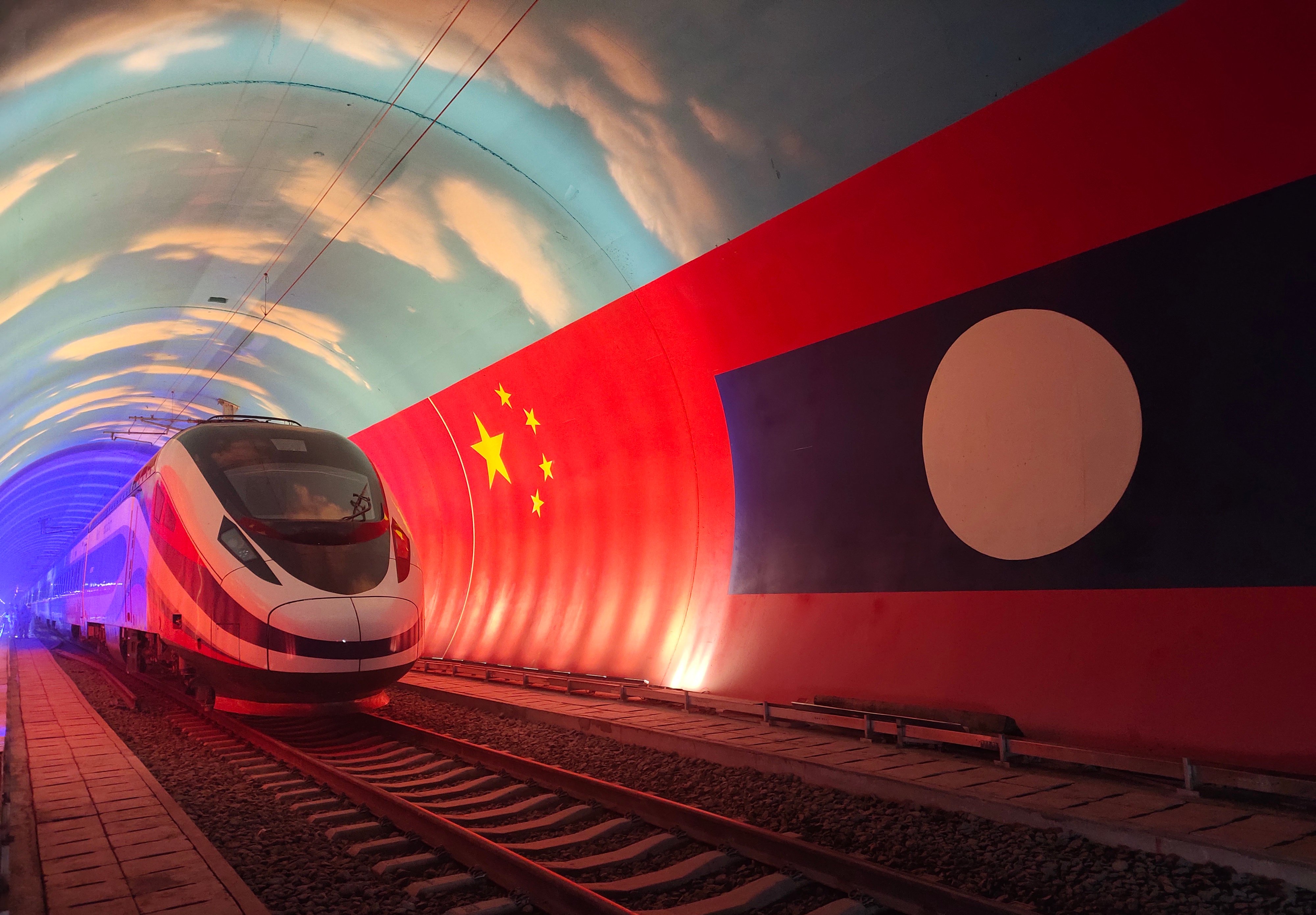 The Lane Xang electric multiple unit train passes by the China-Laos borderline inside a tunnel in October 2021. Photo: Xinhua