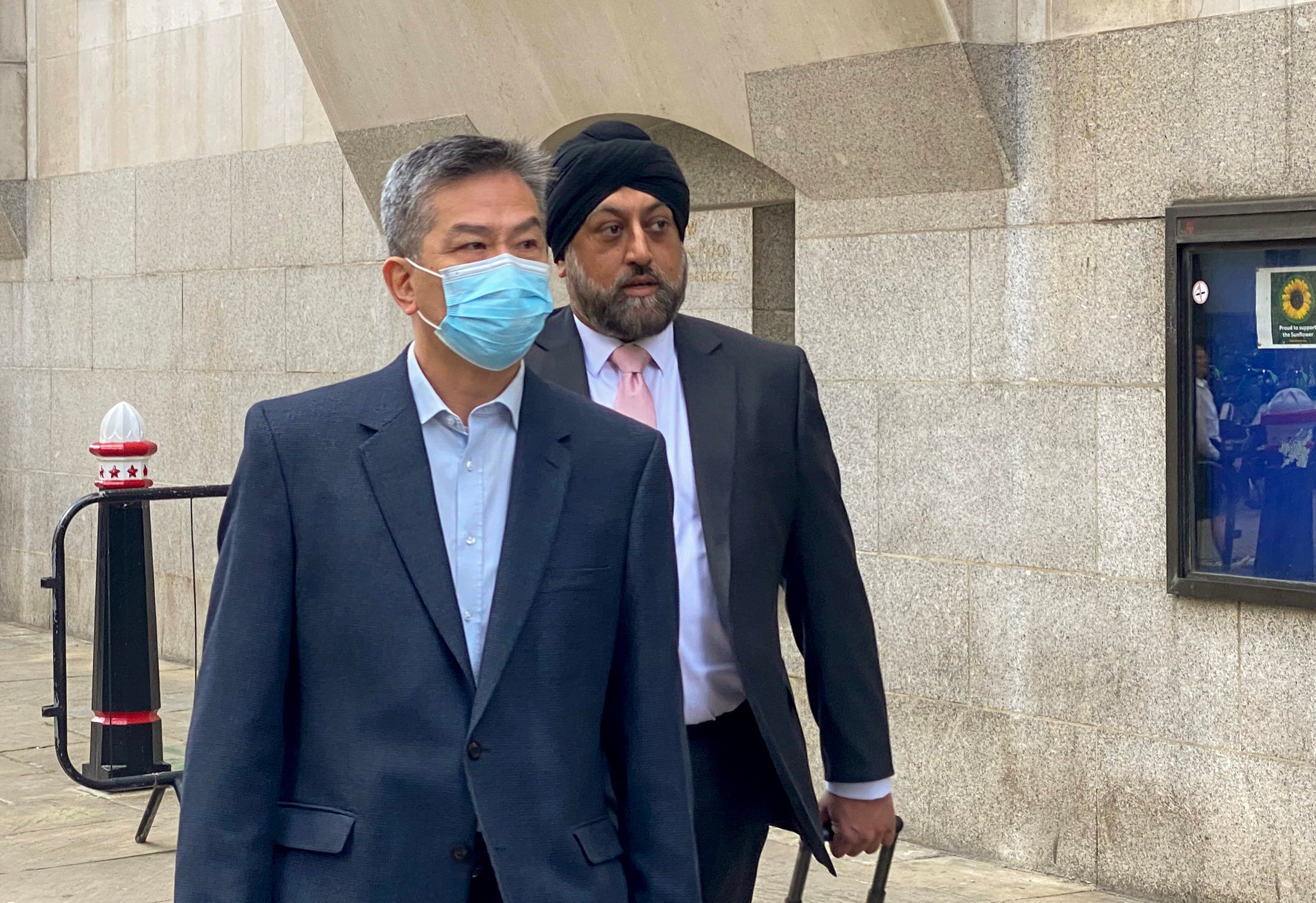 HKETO office manager Bill Yuen heads to court on Friday. Photo: Jack Tsang