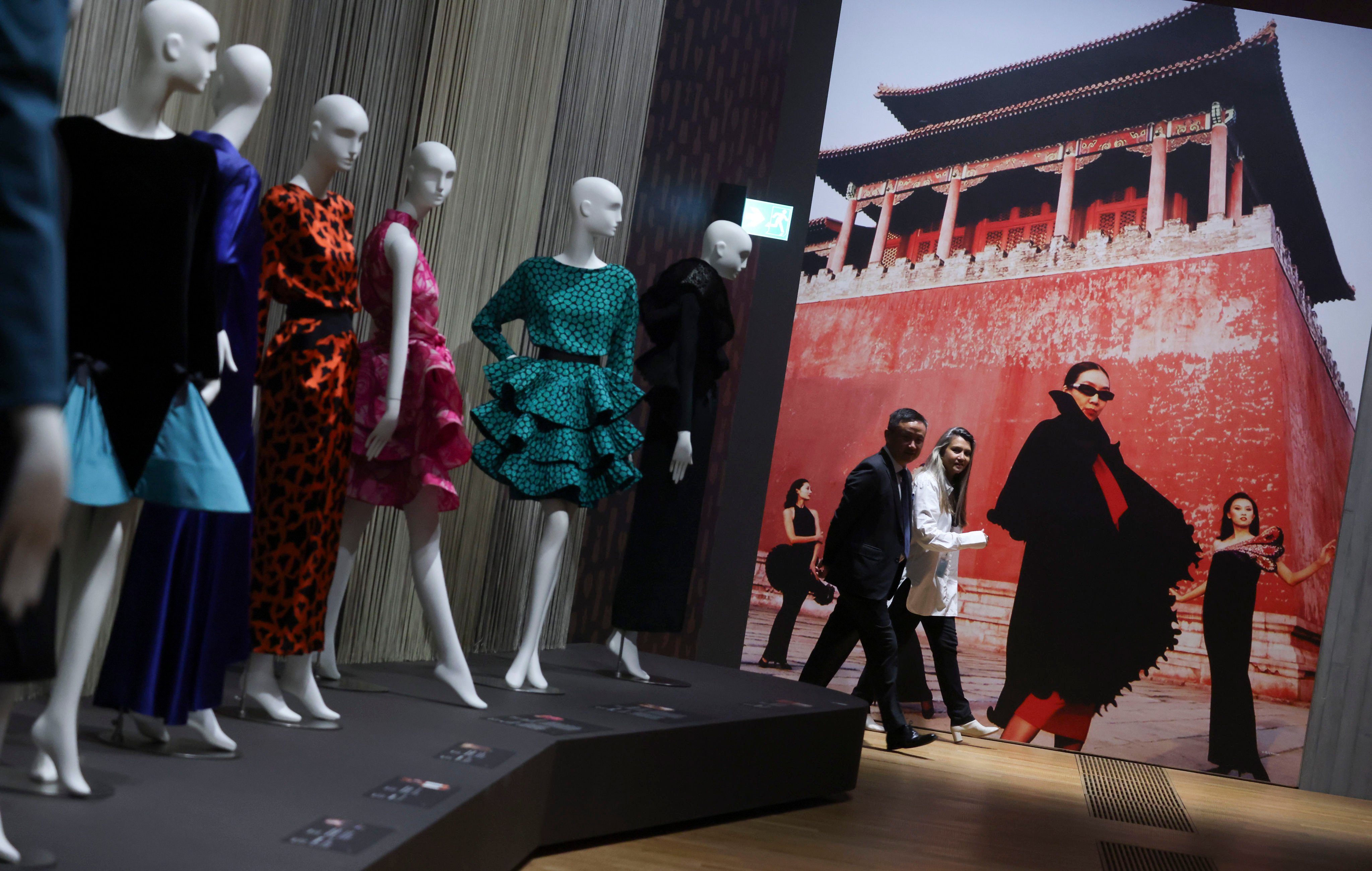 Visitors walk through a special exhibition at the M+ museum at the West Kowloon Cultural District in July last year. Photo: May Tse