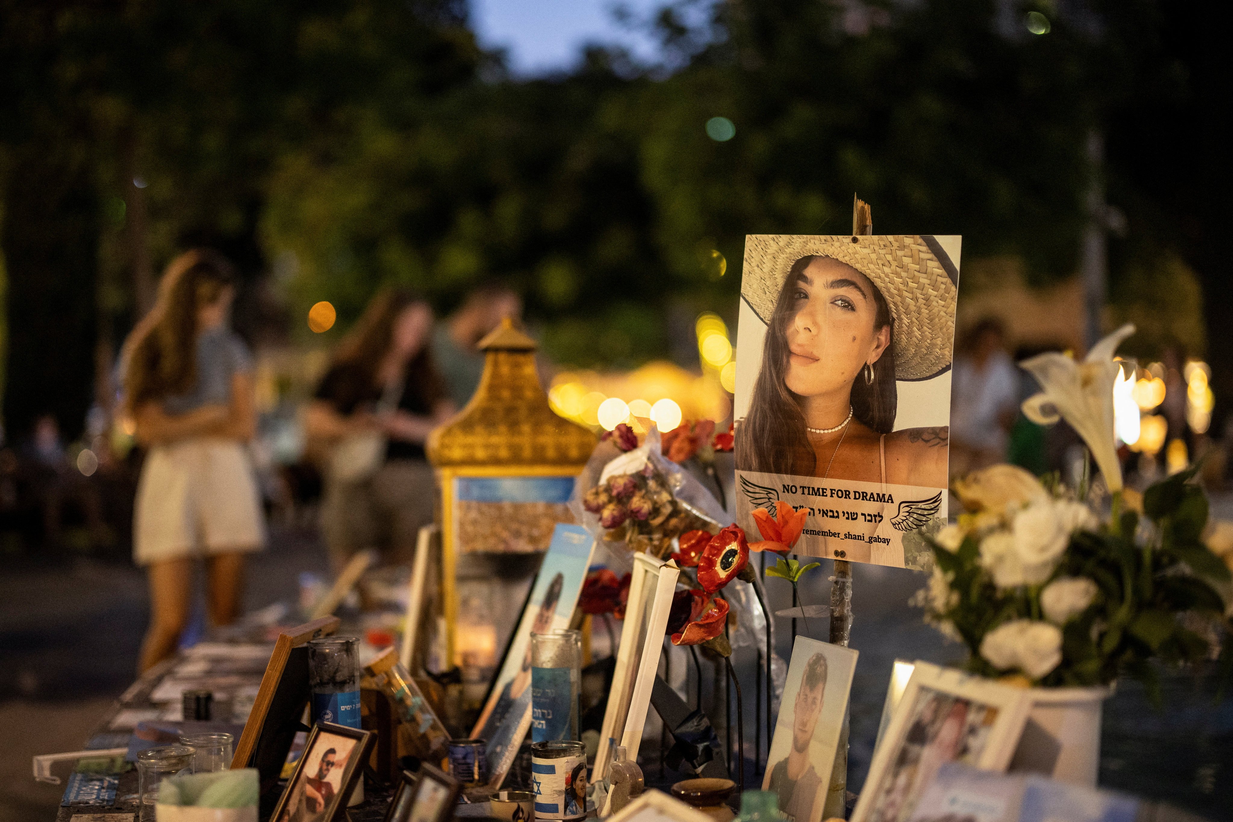 Memorabilia and pictures of the hostages kidnapped in the deadly October 7 attack on Israel by the Palestinian Islamist group Hamas cover a fountain at Dizengoff Square in Tel Aviv. Photo: Reuters
