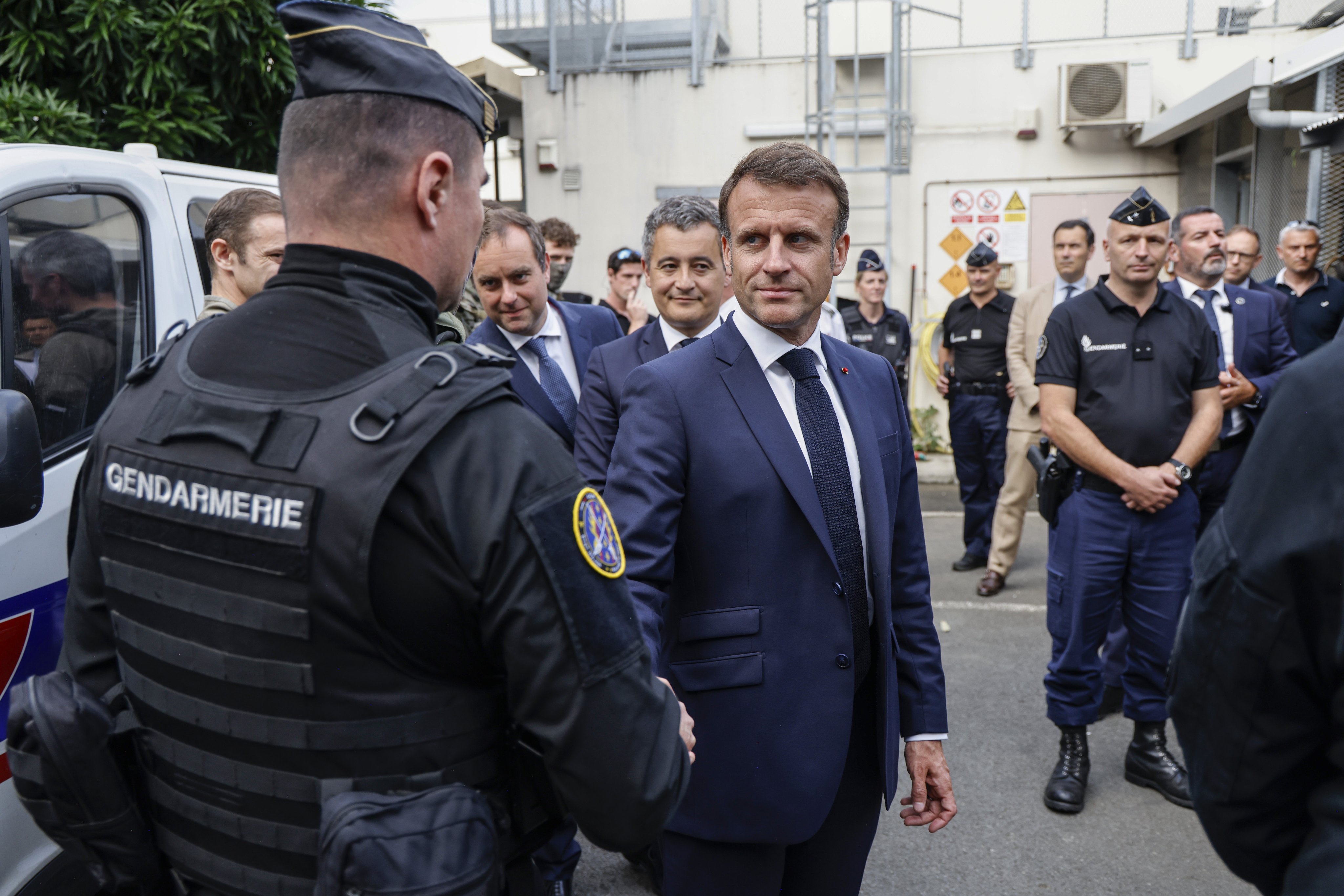 French President Emmanuel Macron (centre) visits the central police station in Noumea, New Caledonia, on Thursday. Photo: EPA-EFE