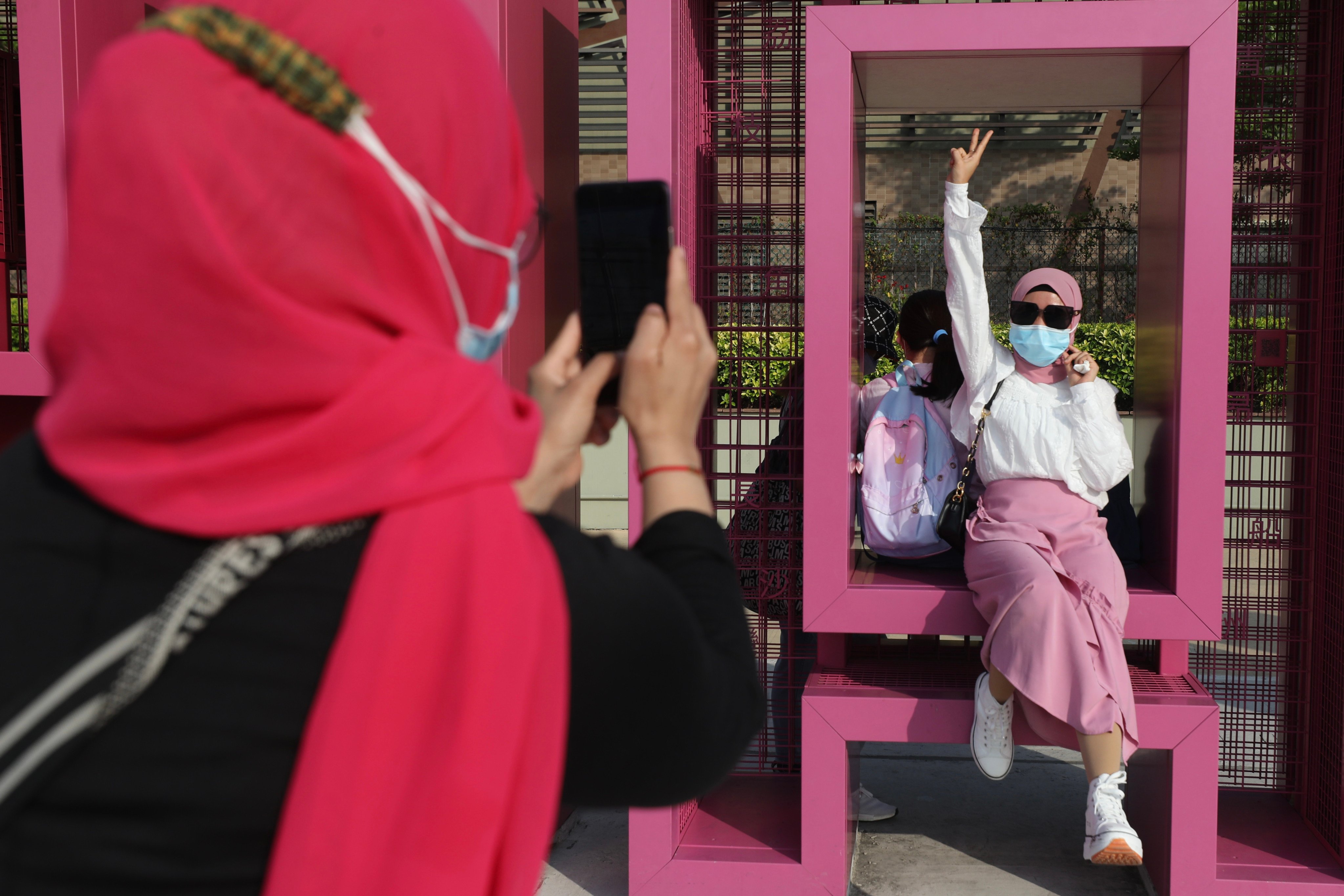 Women wearing the hijab enjoy a sunny afternoon on the waterfront in Tin Hau on April 23, 2022. While Hong Kong has anti-discrimination ordinances, loopholes in legislation mean women can find it difficult to seek redress after being mistreated for wearing a hijab. Photo: Xiaomei Chen