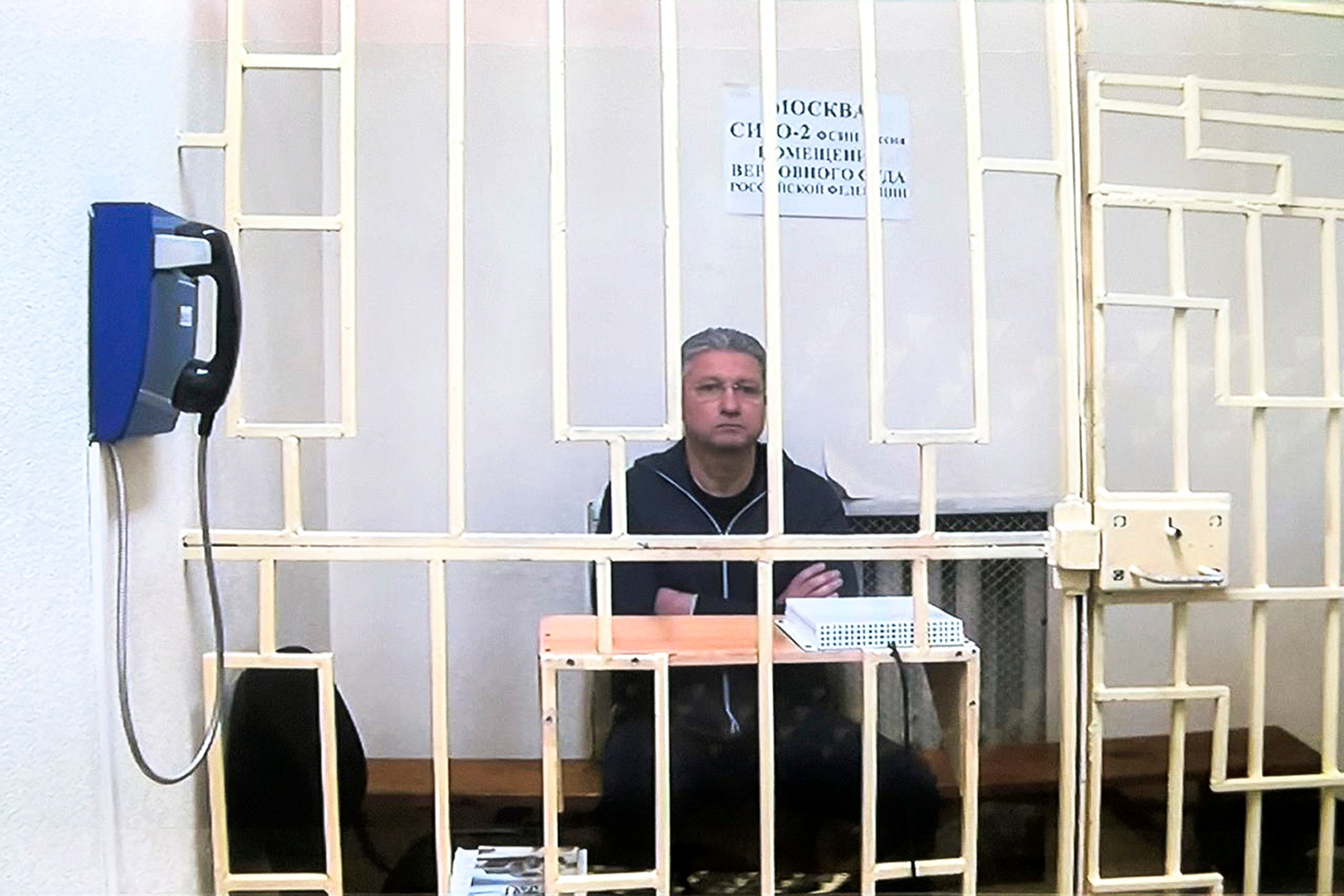 Russian Deputy Defence Minister Timur Ivanov behind bars in a courtroom in Moscow, earlier this month. Moscow City Court via AP