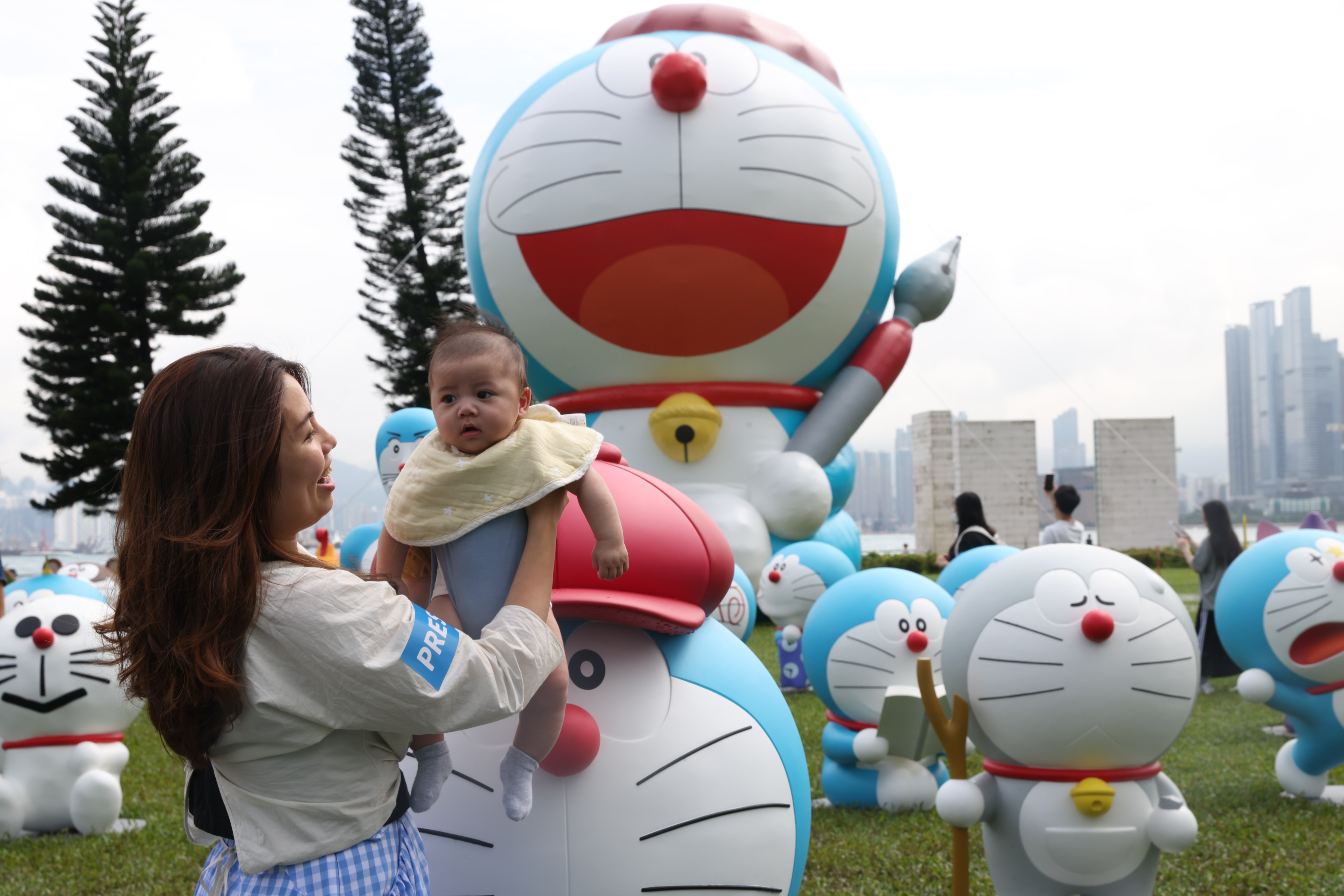 Visitors pose for pictures at a Doraemon installation. Photo: Yik Yeung-man