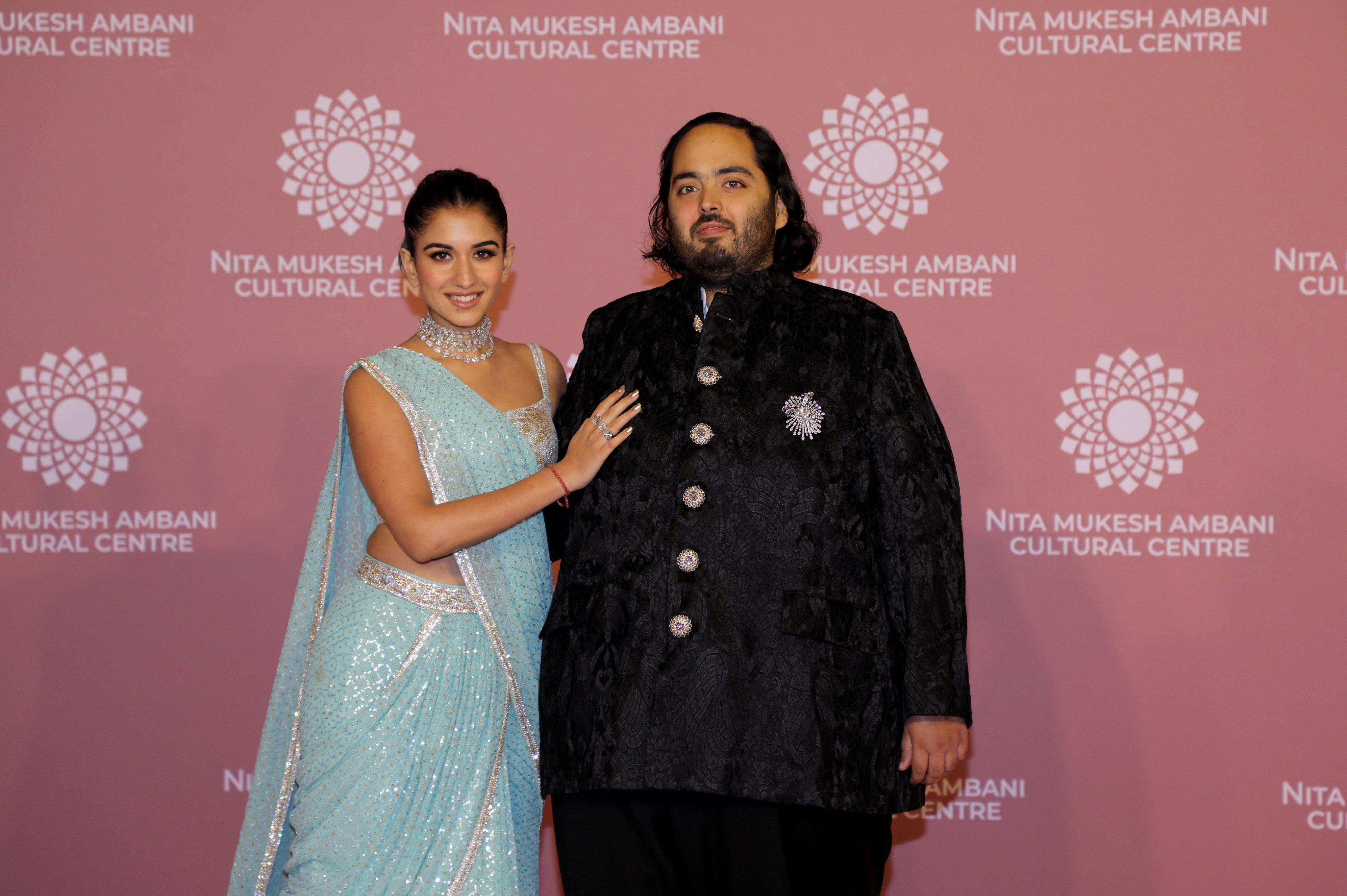 Anant Ambani with his fiancée Radhika Merchant in Mumbai. Photo: Reuters