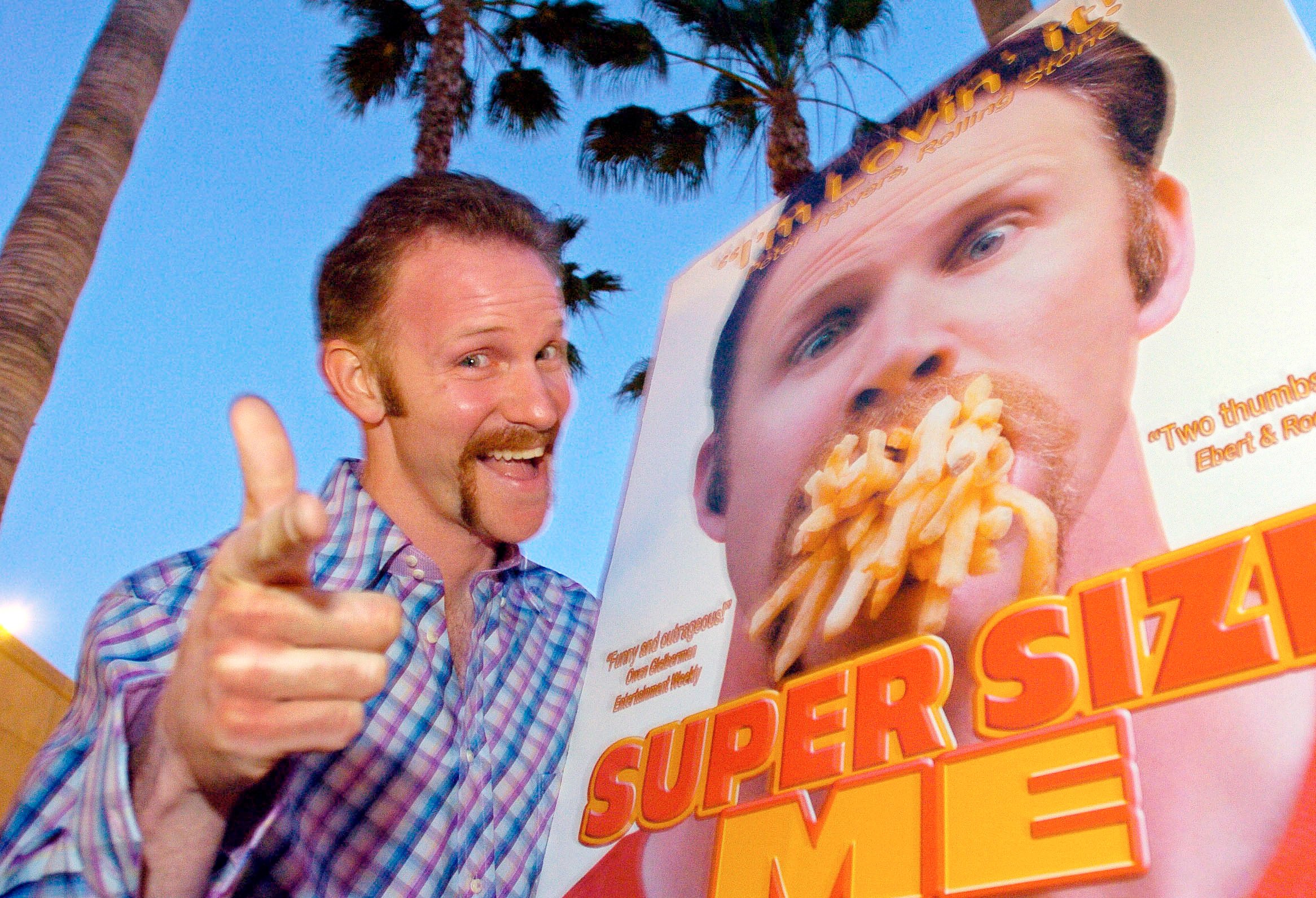 Morgan Spurlock poses at the Los Angeles premiere of his film Super Size Me on April 22, 2004. Photo: AP/File