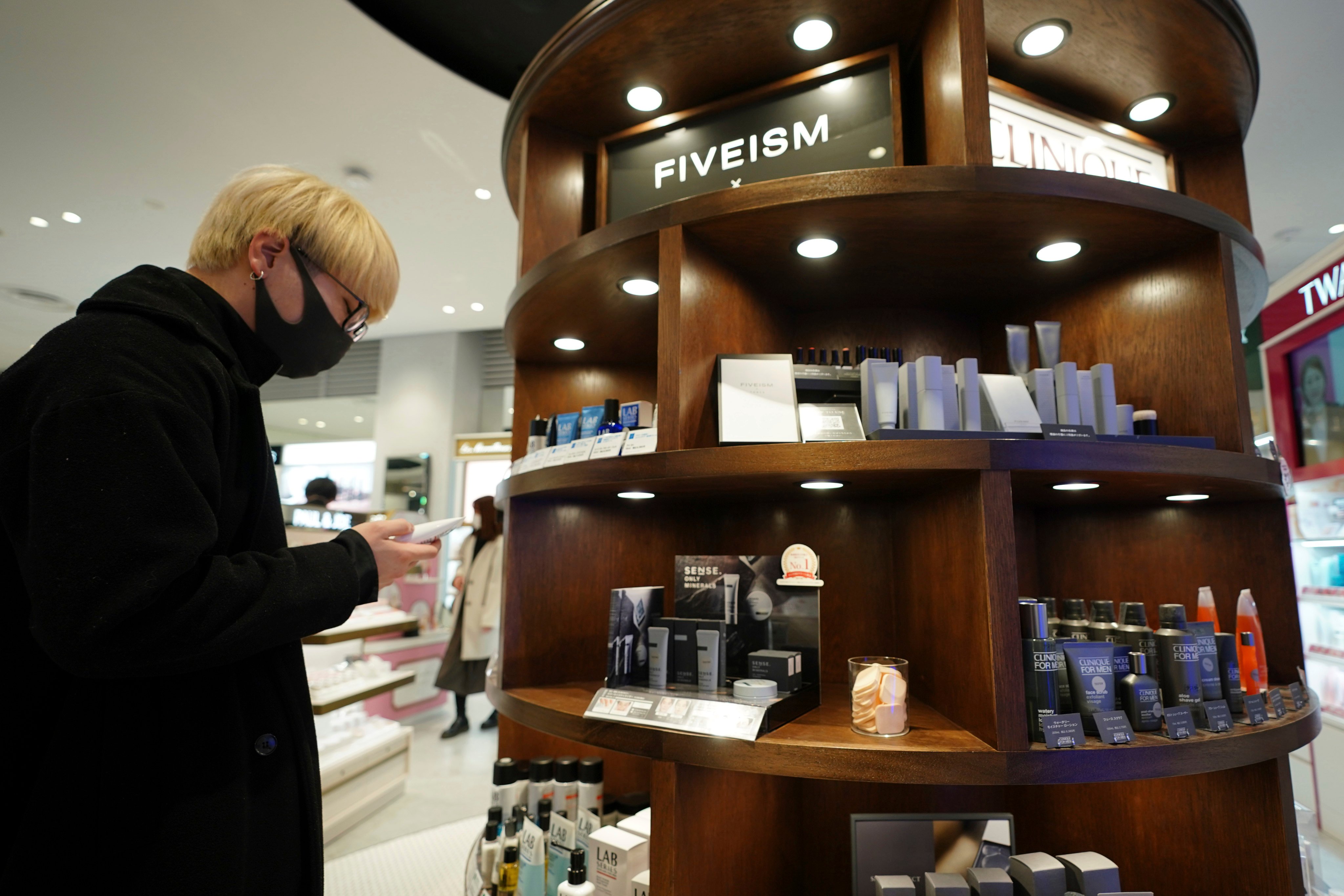 A cosmetics story in Tokyo. More older Japanese men are using beauty products to enhance their looks. Photo: AP