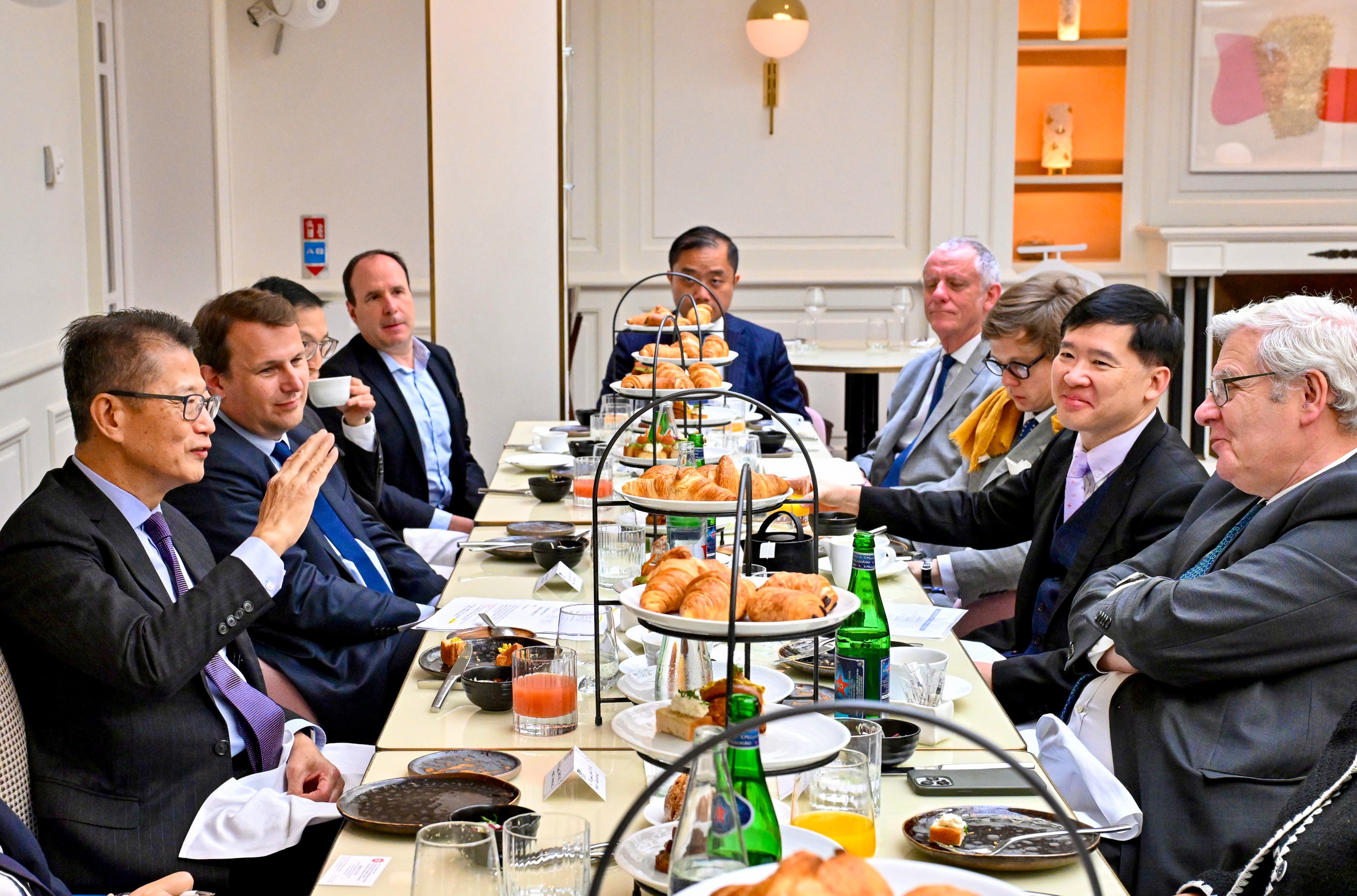 Finance chief Paul Chan (first on left) meets leaders from French financial institutions and business communities. Photo: Handout 