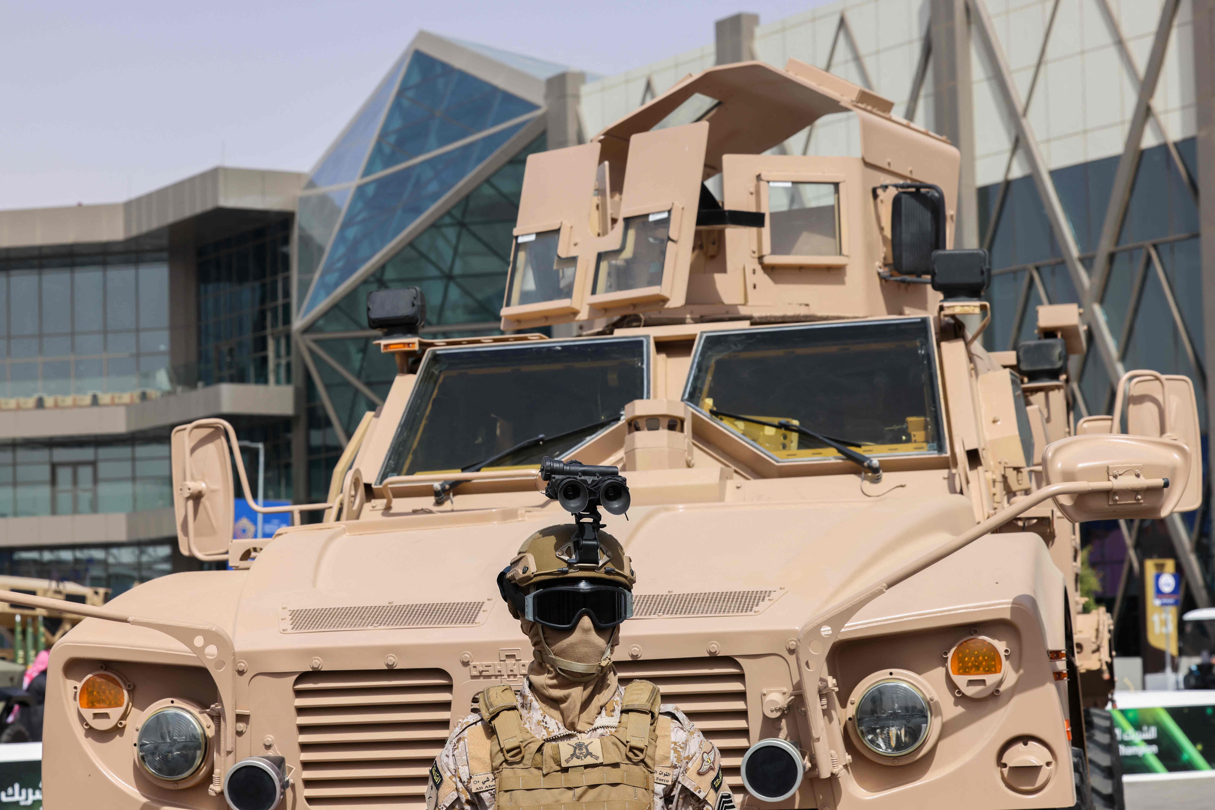 A member of Saudi Arabia’s special armed forces stands in front of a military vehicle during a defence expo in the kingdom. Photo: AFP