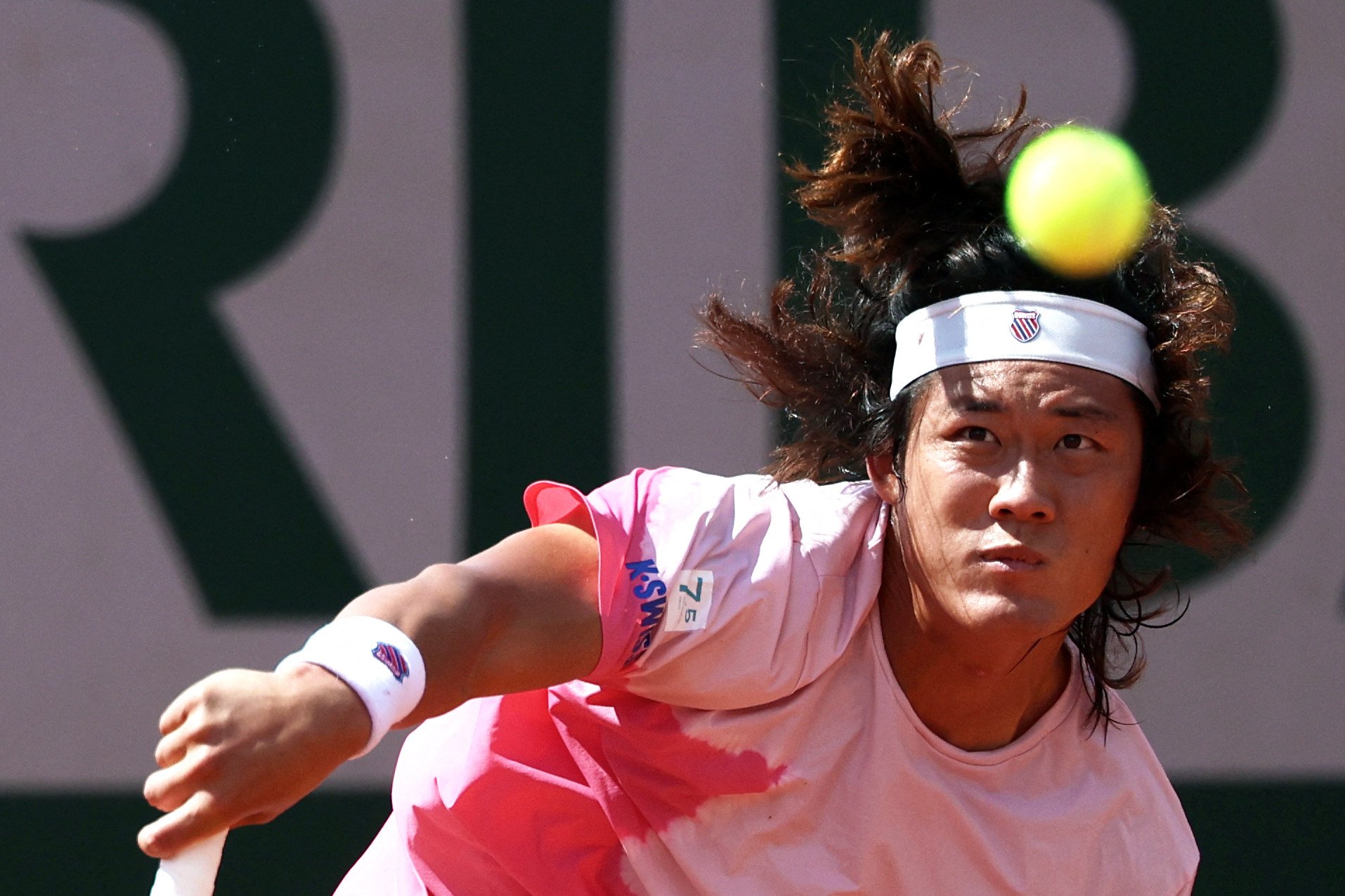 China’s Zhang Zhizhen serves to Australia’s Aleksandar Vukic during their men’s singles match on day one of the French Open. Photo: AFP