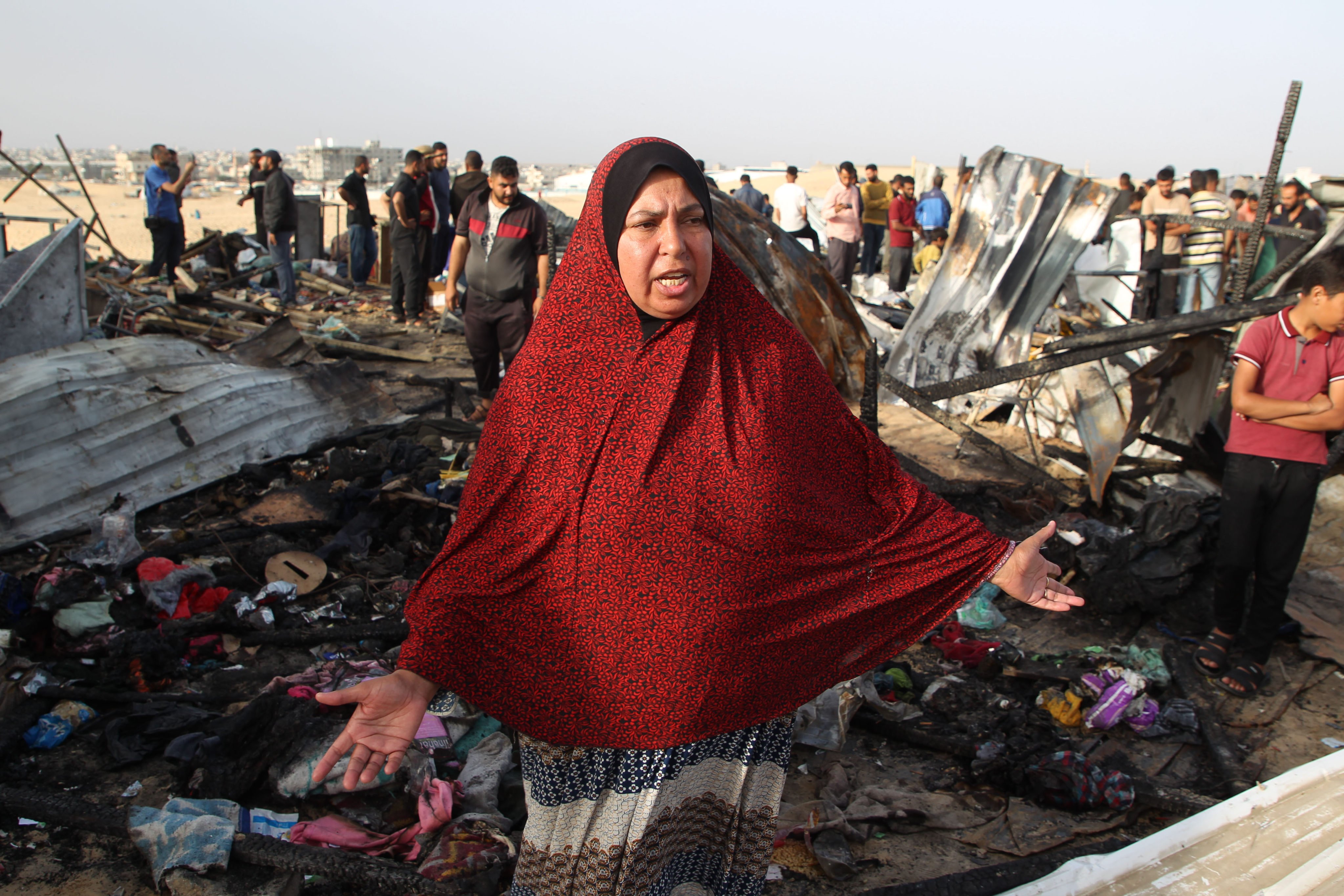 A person reacts at the site of an Israeli strike on a camp for displaced people in Rafah in the southern Gaza Strip on Monday. Photo: Xinhua