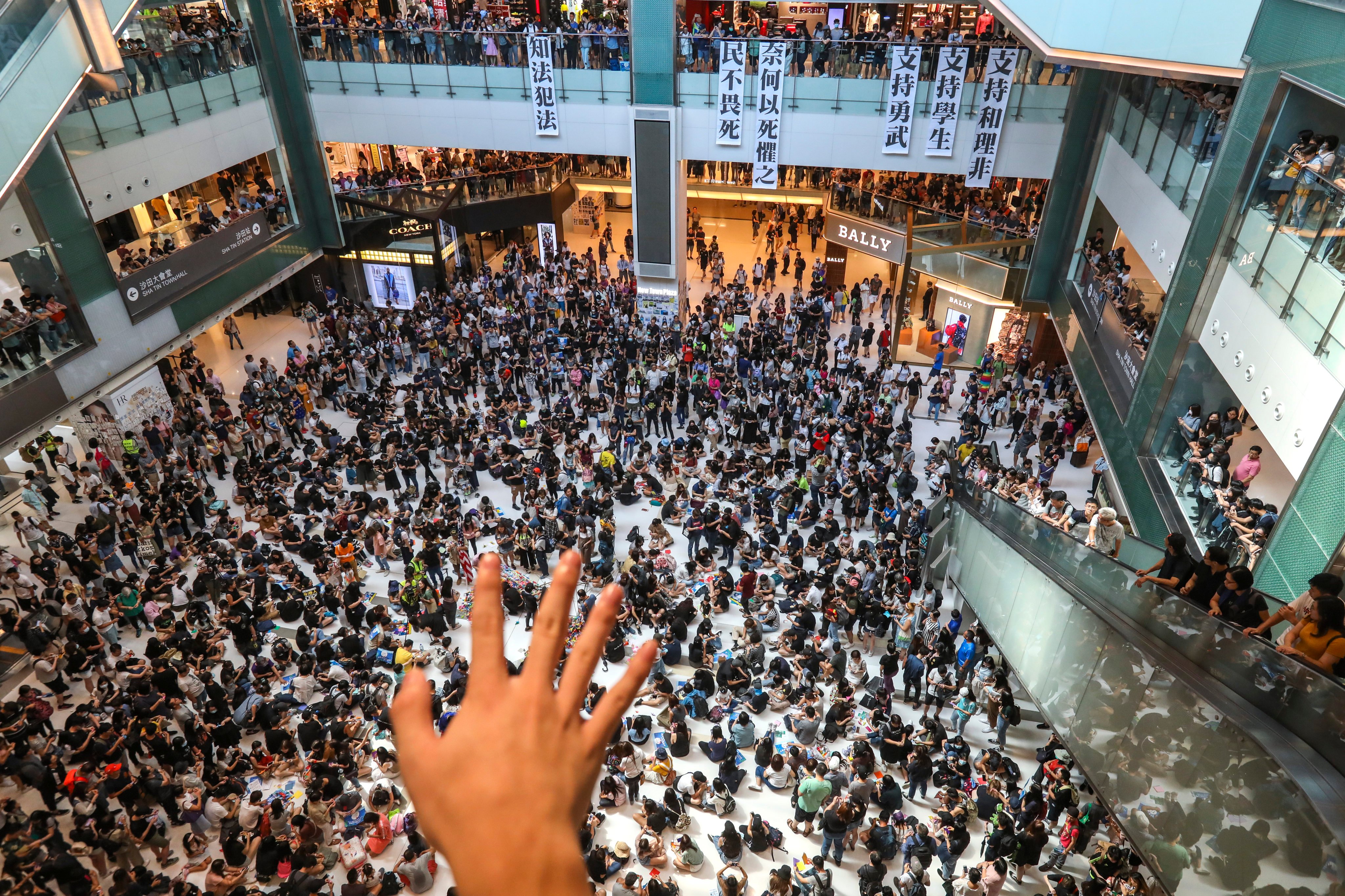 Anti-government protesters gather in New Town Plaza in Sha Tin during the 2019 social unrest. Photo: Nora Tam