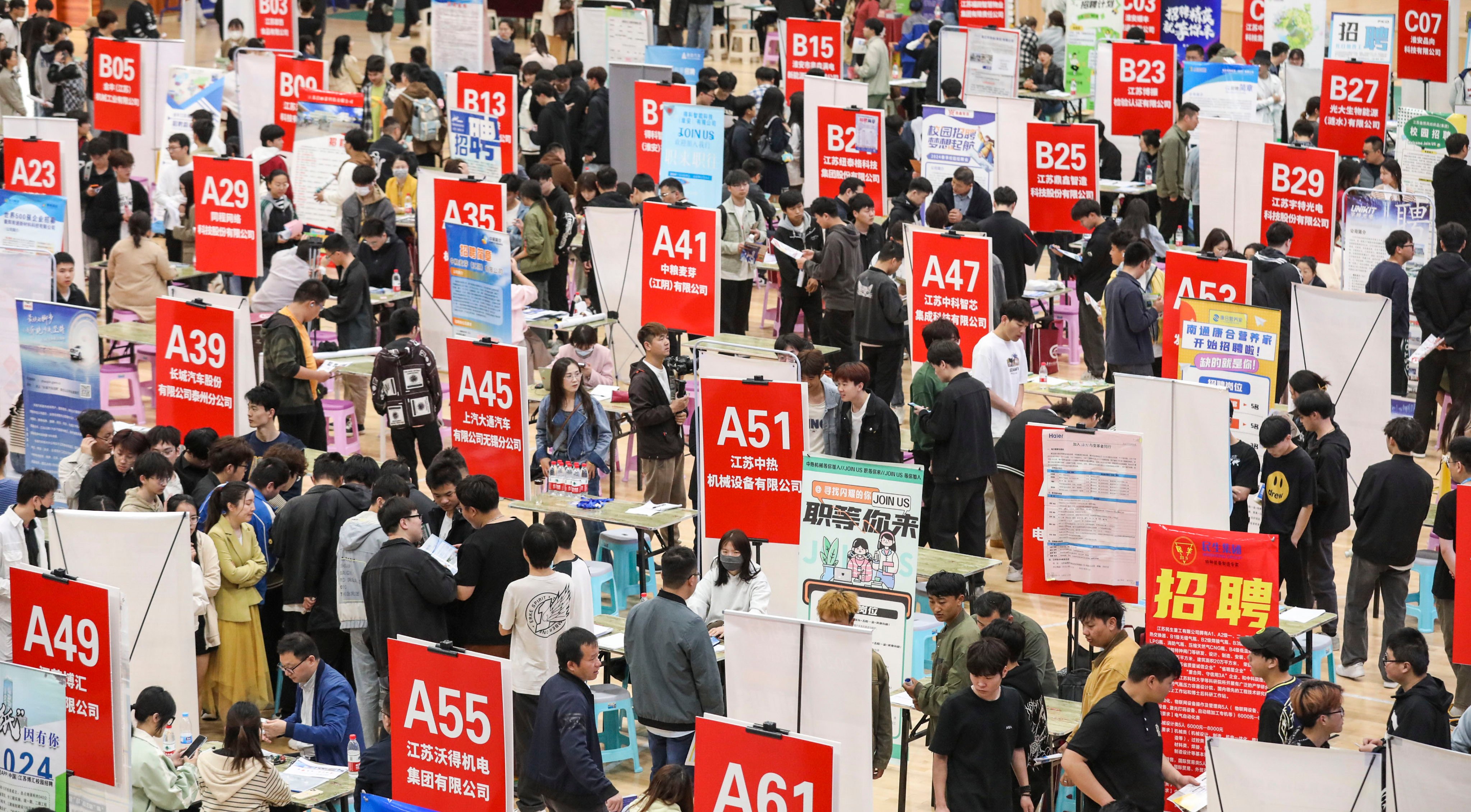 Students attend a campus job fair in the east China city of Huai’an on April 27. Photo: NurPhoto via Getty Images