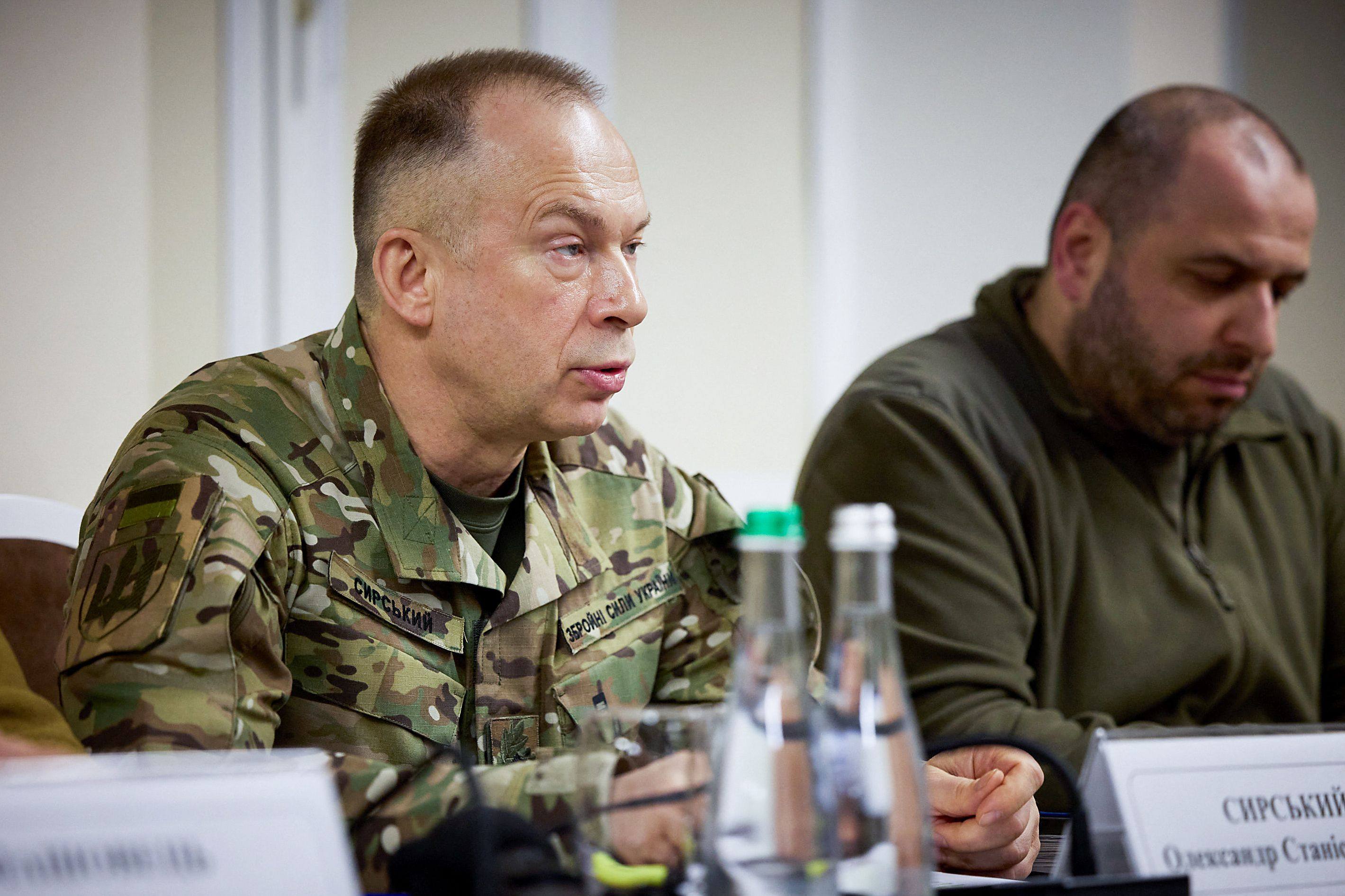 Ukraine’s Colonel General Oleksandr Syrskyi, left. Photo: Ukrainian Presidential Press Service / AFP / Handout
