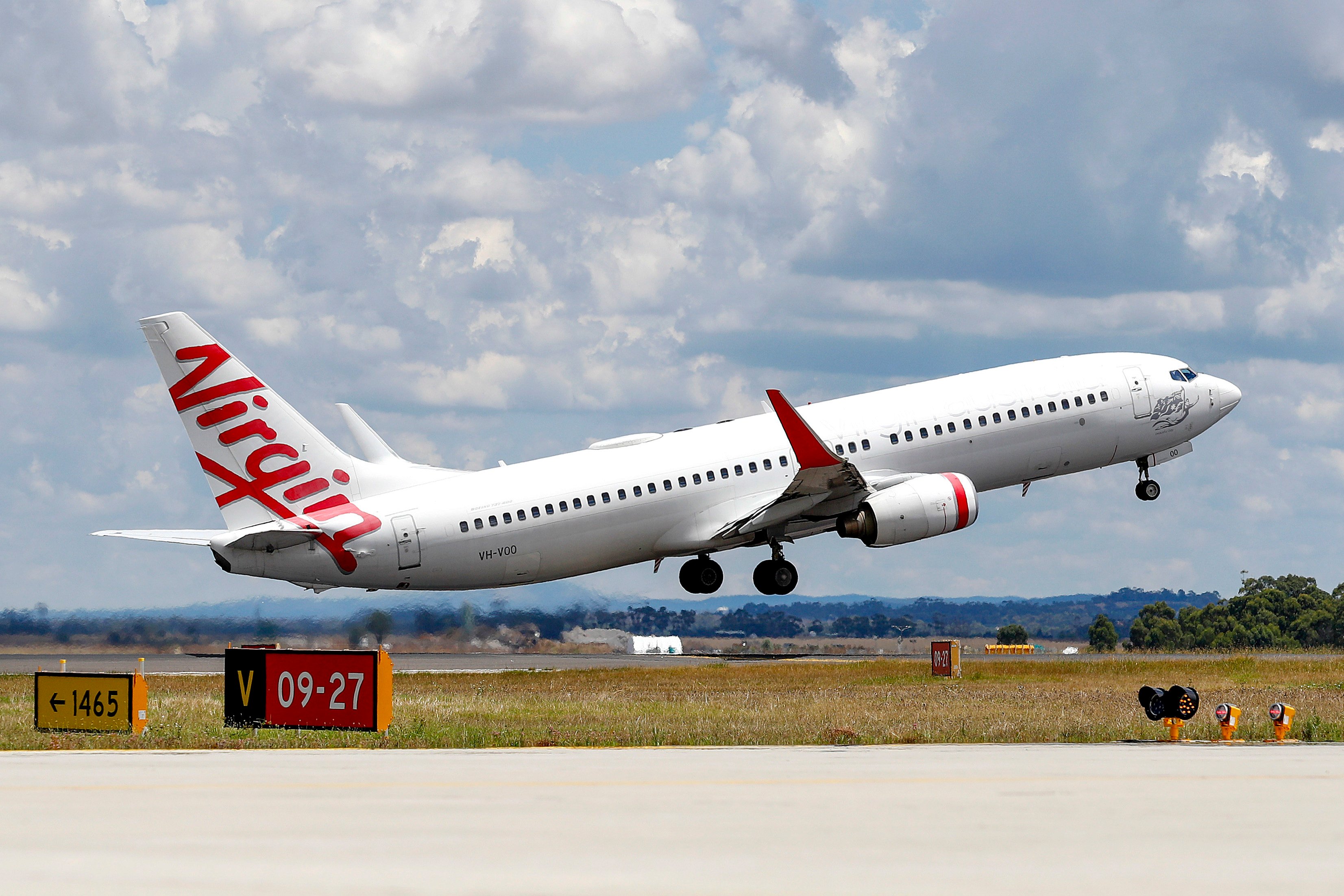 A man accused of running naked down the aisle of an Australian domestic flight, knocking down a flight attendant and forcing the plane to turn back, has been arrested. Photo: AP